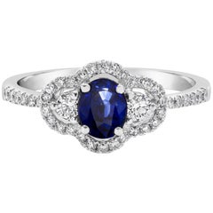 Roman Malakov 0.74 Carat Blue Sapphire and Diamond Three-Stone Engagement Ring