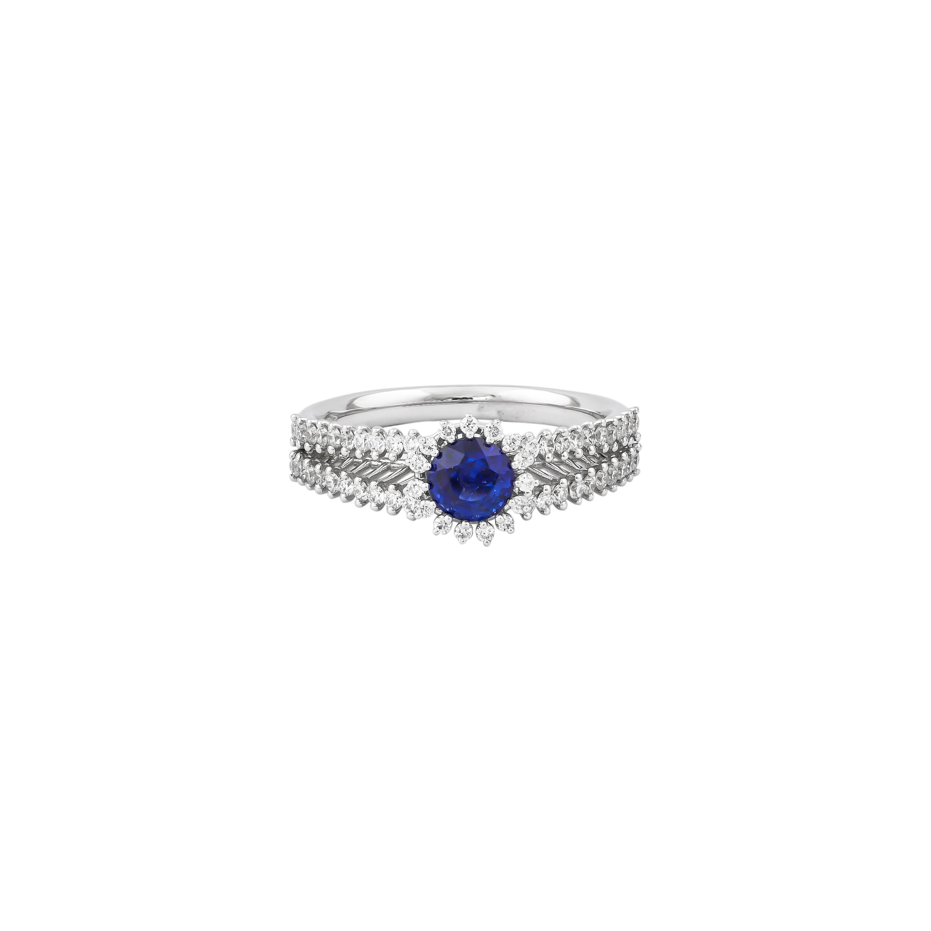 Round Cut 0.74 Carat Blue Sapphire Ring in 18 Karat White Gold For Sale