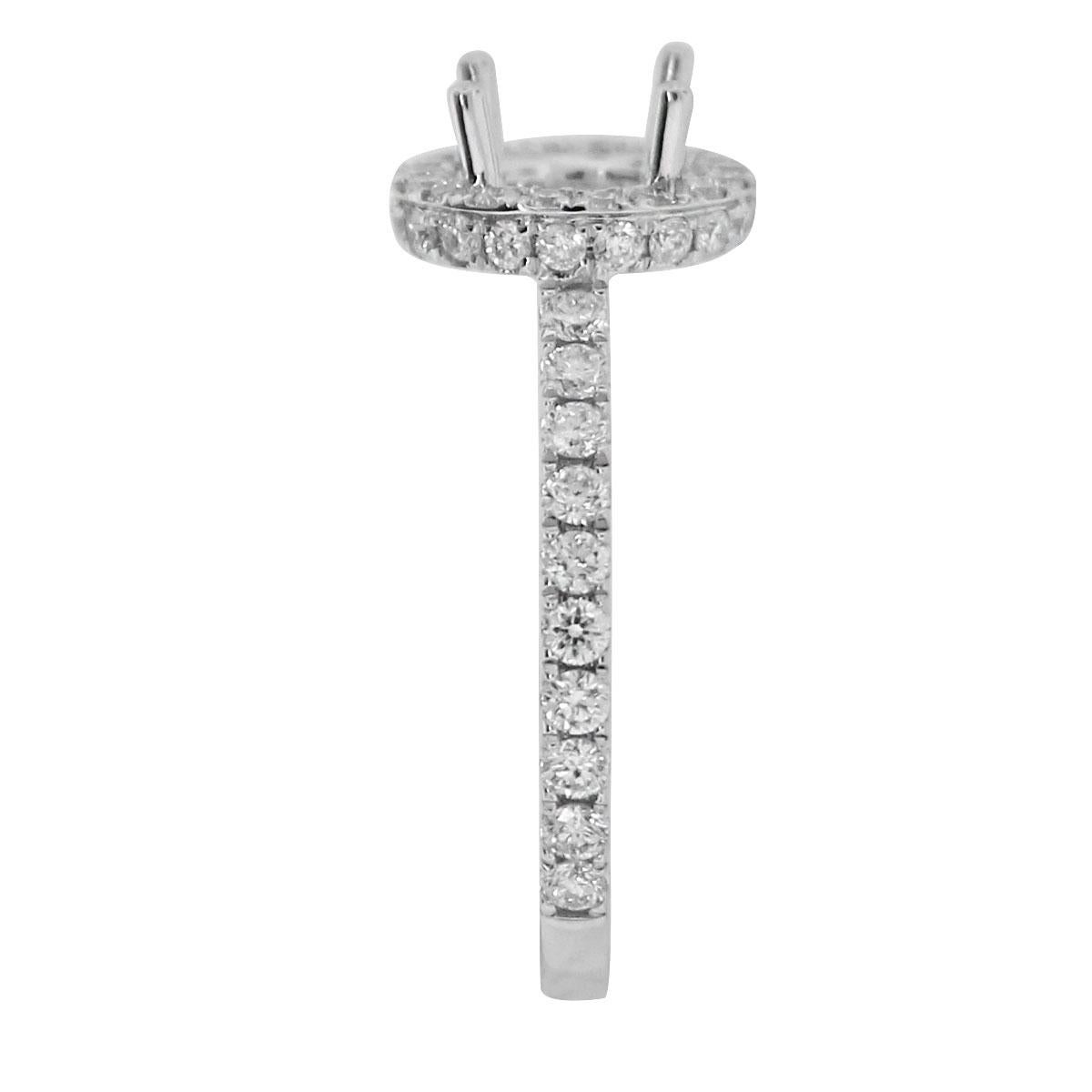 Material: 18k White Gold
Diamond Details: Approximately 0.74ctw round brilliant diamonds. Diamonds are G/H in color and VS2-SI1 in clarity.
Ring Size: 6.5 (can be sized)
Total Weight: 3.2g (2dwt)
Measurements: 0.80