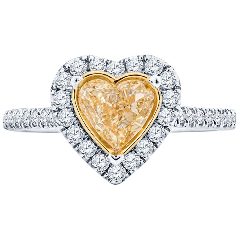 0.74 Carat Fancy Intense Yellow Heart Diamond 18 Karat White Gold Ring, GIA