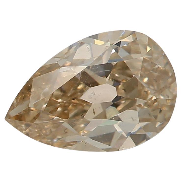 0.74 Carat Fancy Light Yellow Brown Pear cut diamond SI1 Clarity GIA Certified For Sale