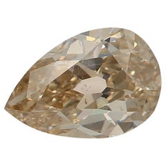 0.74 Carat Fancy Light Yellow Brown Pear cut diamond SI1 Clarity GIA Certified