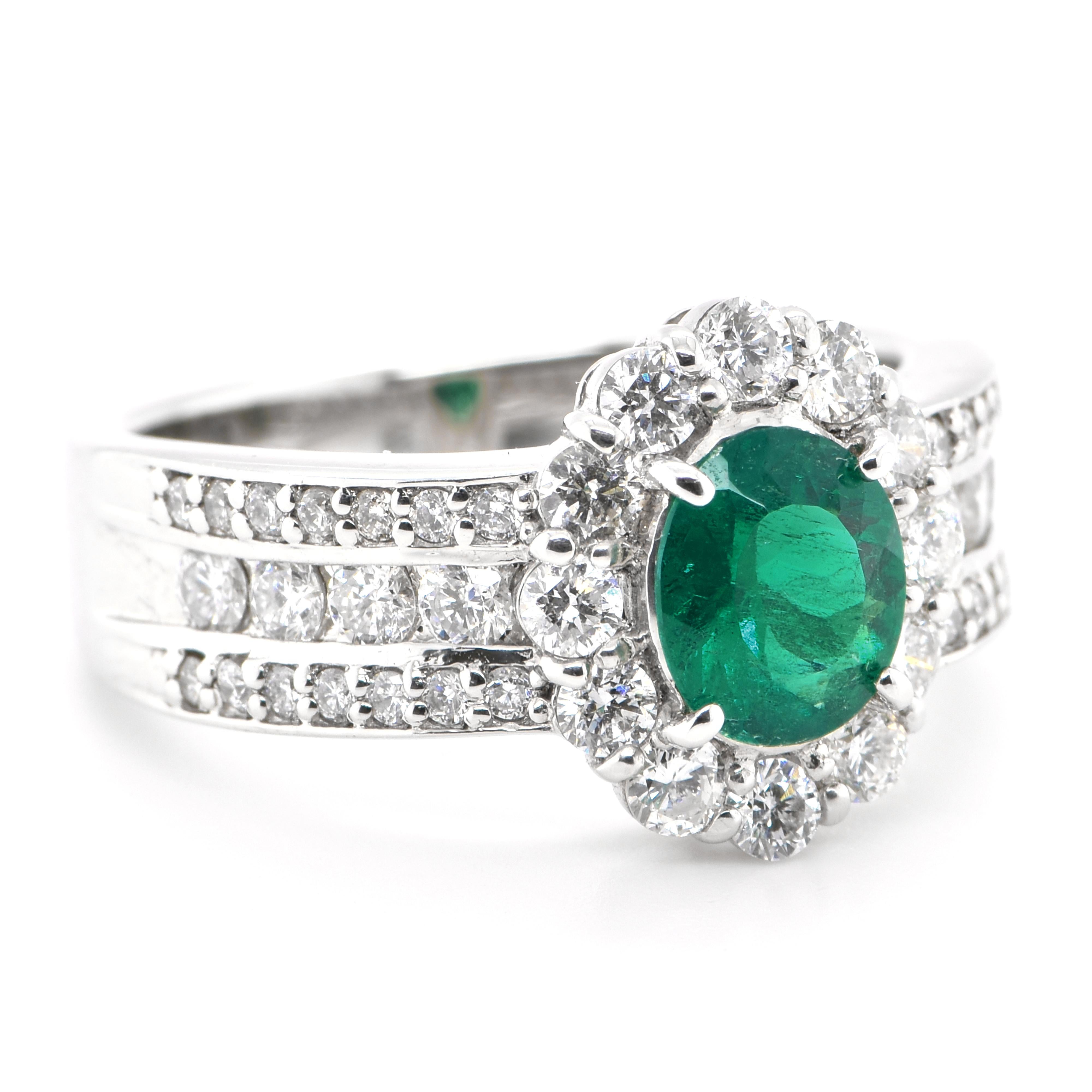 Modern 0.74 Carat Natural Untreated 'No-Oil' Emerald and Diamond Ring Set in Platinum