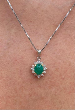 0.74 Carat Oval-Cut Colombian Emerald and Diamond 18 Karat White Gold Pendant