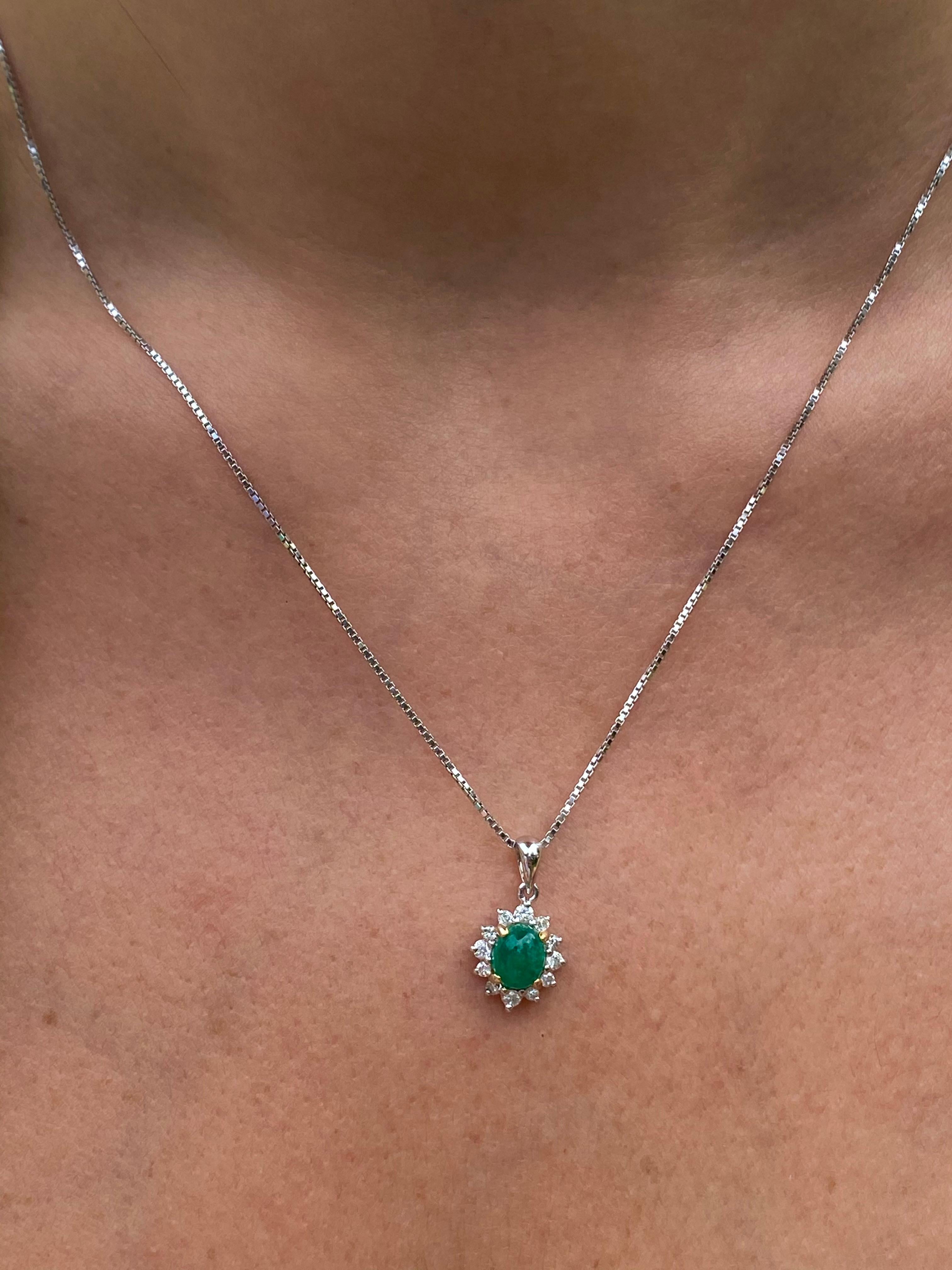 Emerald Cut 0.74 Carat Oval-Cut Colombian Emerald and Diamond 18 Karat White Gold Pendant For Sale