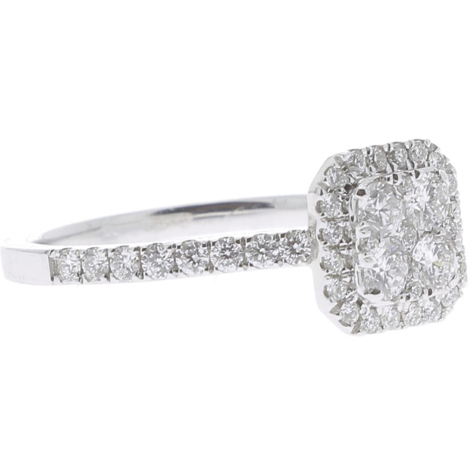 The Cushion Ring is a unique and trendy ring set with 0,74 carat.
The Wedding Ring is set with Brilliants and paved with 4 Diamonds.
The Ring is in 18K White Gold.
The Diamonds are GVS quality.
The ring size is 6 ½ US and can be size.