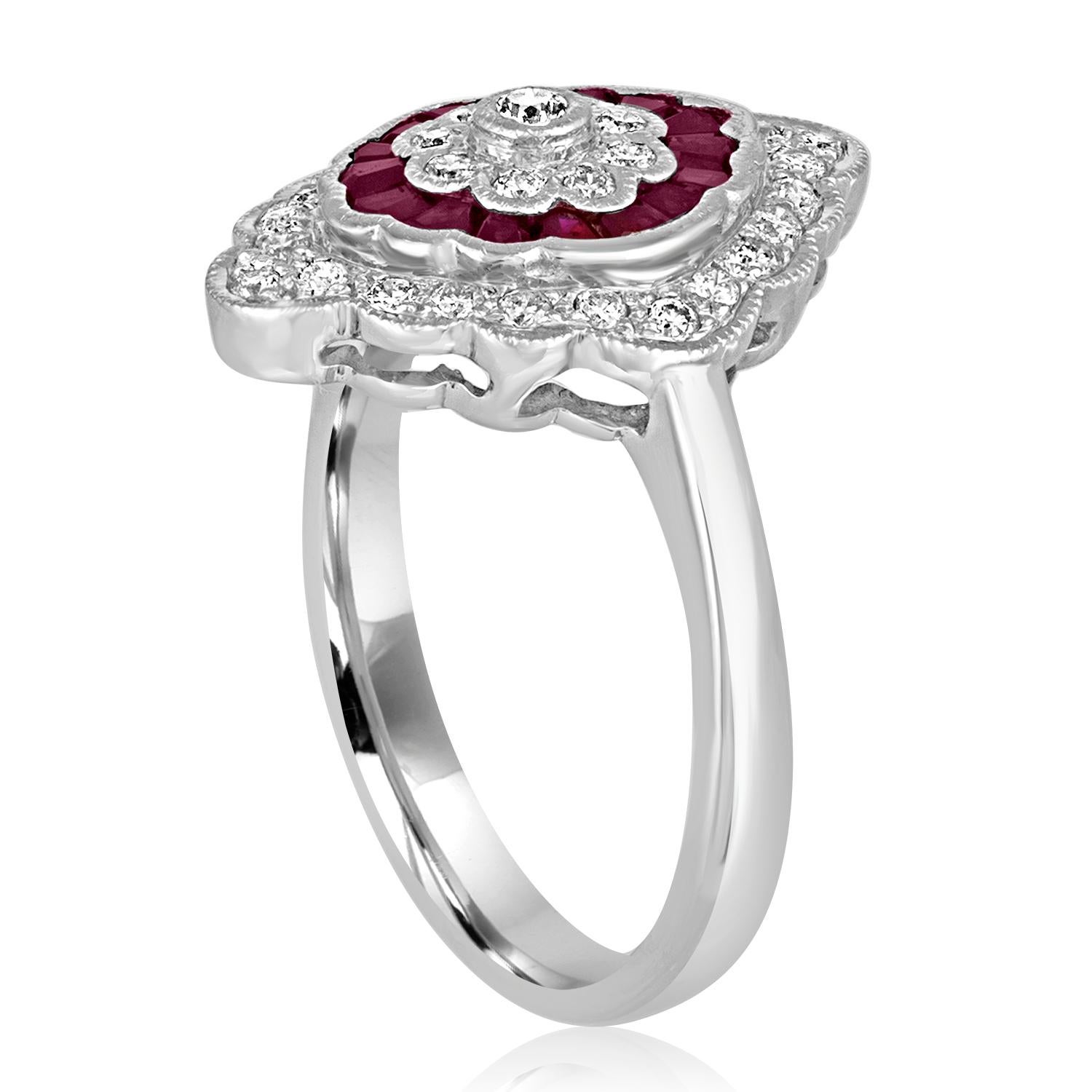 Art Deco Revival Style Ring.
The ring is 18K White Gold
There are 0.44 Carats in Diamonds H SI
There are 0.30 Carats in Rubies
The ring is a size 6.50, sizable.
The ring measures 0.75