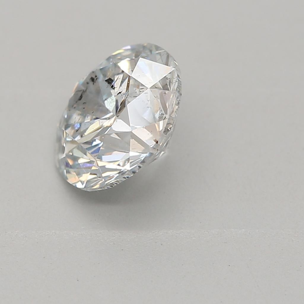 Round Cut 0.74 Carat Very Light Blue Round cut diamond I1 Clarity GIA Certified For Sale