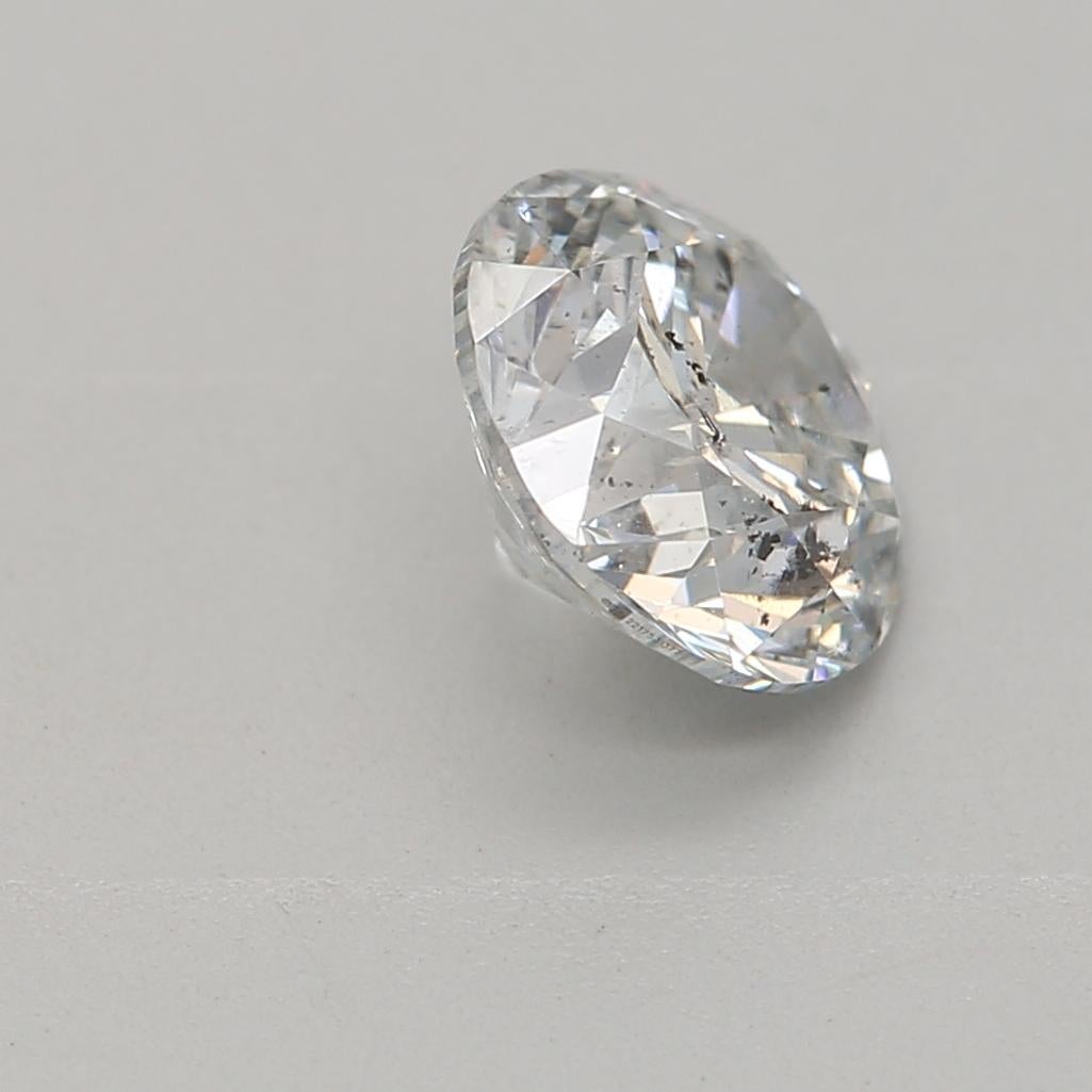 Women's or Men's 0.74 Carat Very Light Blue Round cut diamond I1 Clarity GIA Certified For Sale