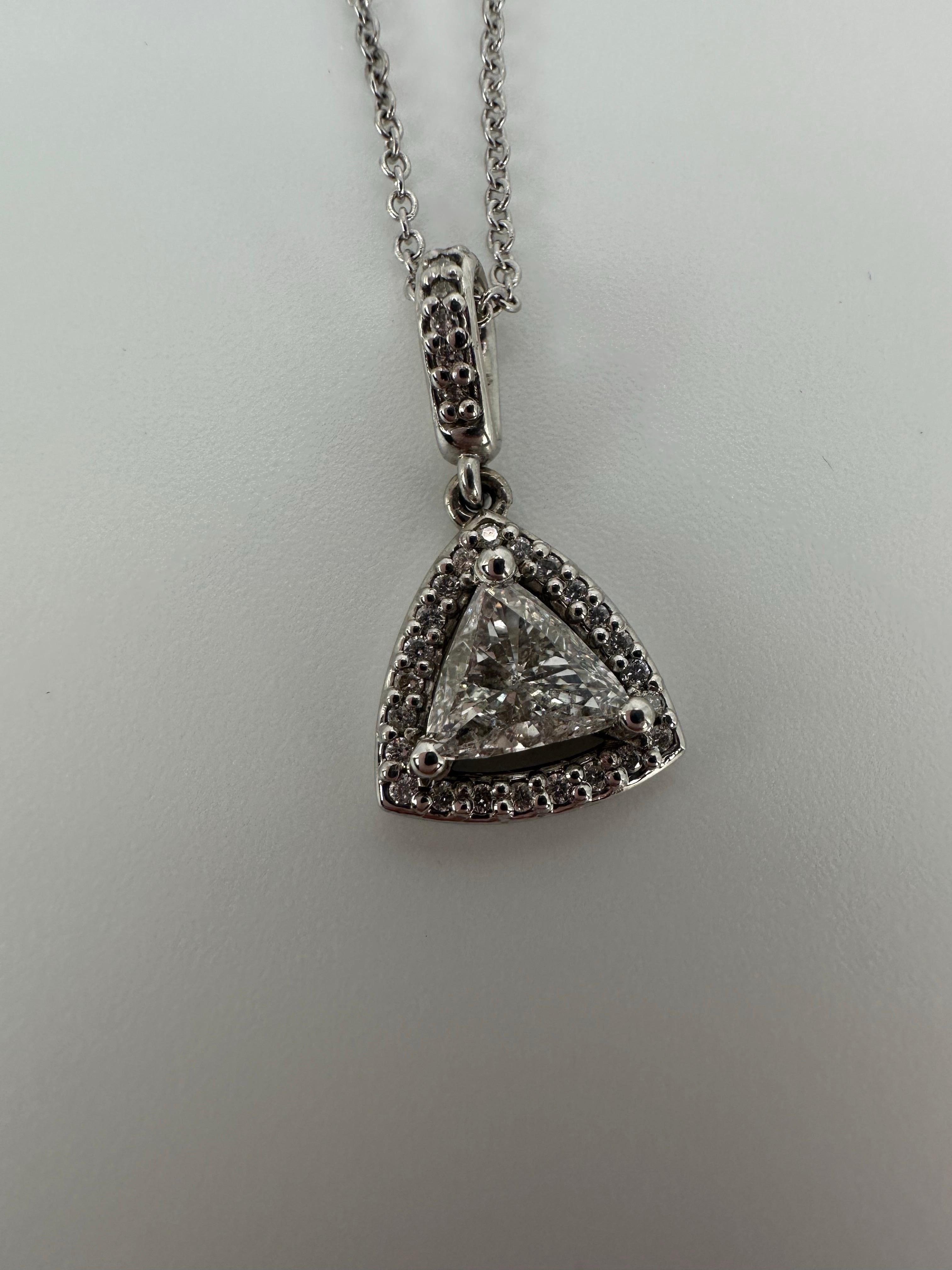 Modern trillion pendant necklace in 14KT gold made with natural diamonds totaling 0.74 carats. Diamonds are VS-SI, F color. Stunning piece perfect for Valentines day or any other occasion!

Comes with beautiful packaging, certificate of authenticity