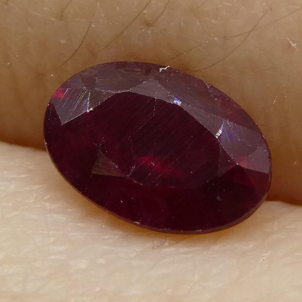 Description:

Gem Type: Ruby
Number of Stones: 1
Weight: 0.74 cts
Measurements: 6.18x4.24x3.10 mm
Shape: Oval
Cutting Style Crown: Modified Brilliant
Cutting Style Pavilion: Step Cut
Transparency: Translucent
Clarity: Moderately Included: Inclusions