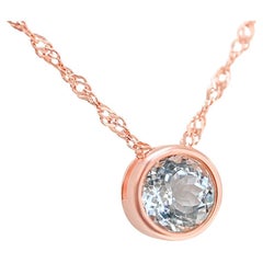 Collier pendentif aigue-marine ronde 0,74 carat plaqué or rose 18 carats et argent sterling