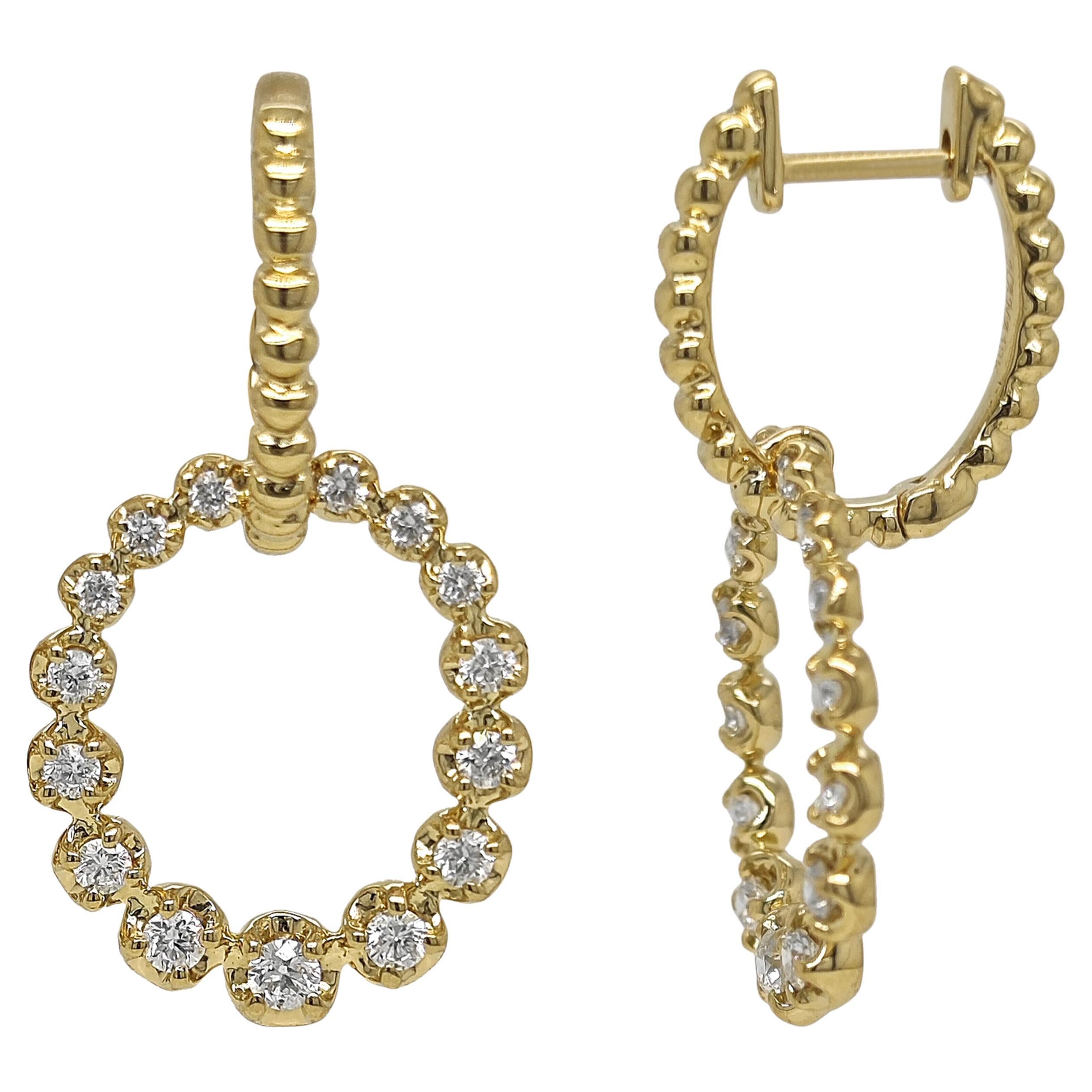 Boucles d'oreilles en or jaune avec diamants blancs de 0.740 carat en vente