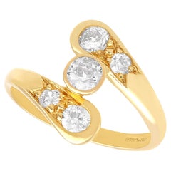 0.74Ct Diamond and 18k Yellow Gold Twist Ring