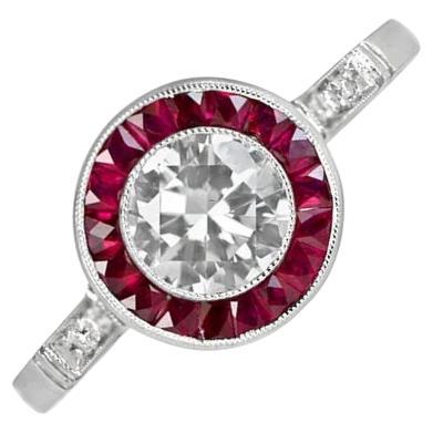 Bague de fiançailles avec un diamant rond de taille brillant de 0,74ct, couleur I, halo de rubis, platine