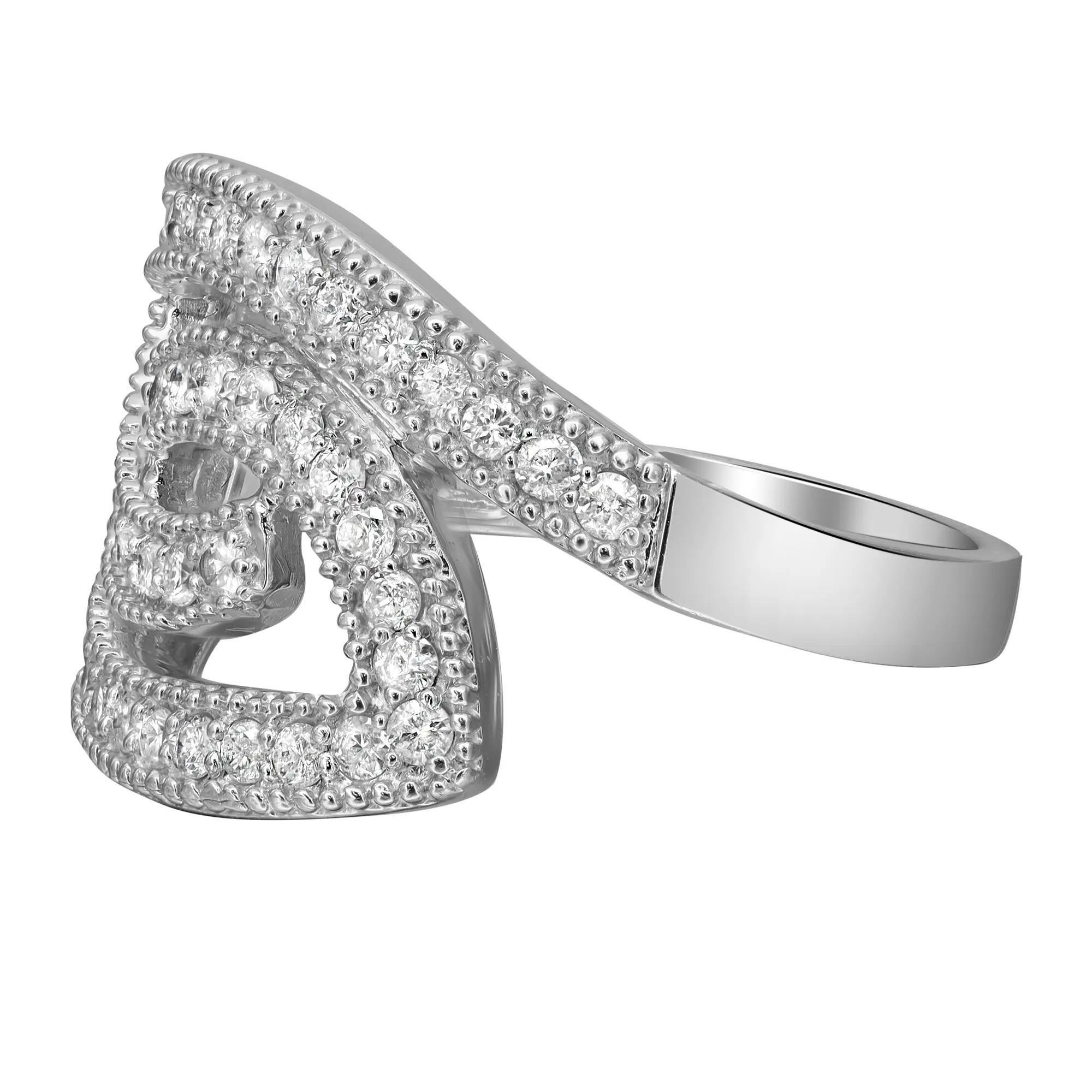 Dazzle away with this stunning ladies cocktail ring. Crafted in 14k white gold. Showcasing pave set round brilliant cut diamonds weighing 0.74 carat. Diamond quality: I color and SI2 clarity. Ring size: 7.5. Total weight: 6.12 grams. This ring is an