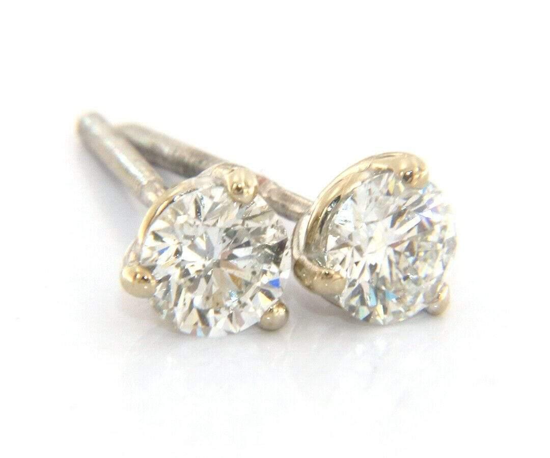 0.74ctw Round Diamond Solitaire Stud Earrings in 14K

Round Diamond Solitaire Stud Earrings
14K White Gold
Diamonds Carat Weight: Approx. 0.74ctw
Clarity: SI1 – SI2
Color: I - J
LGL Certified
Weight: Approx. 1.17 Grams
Stamped: