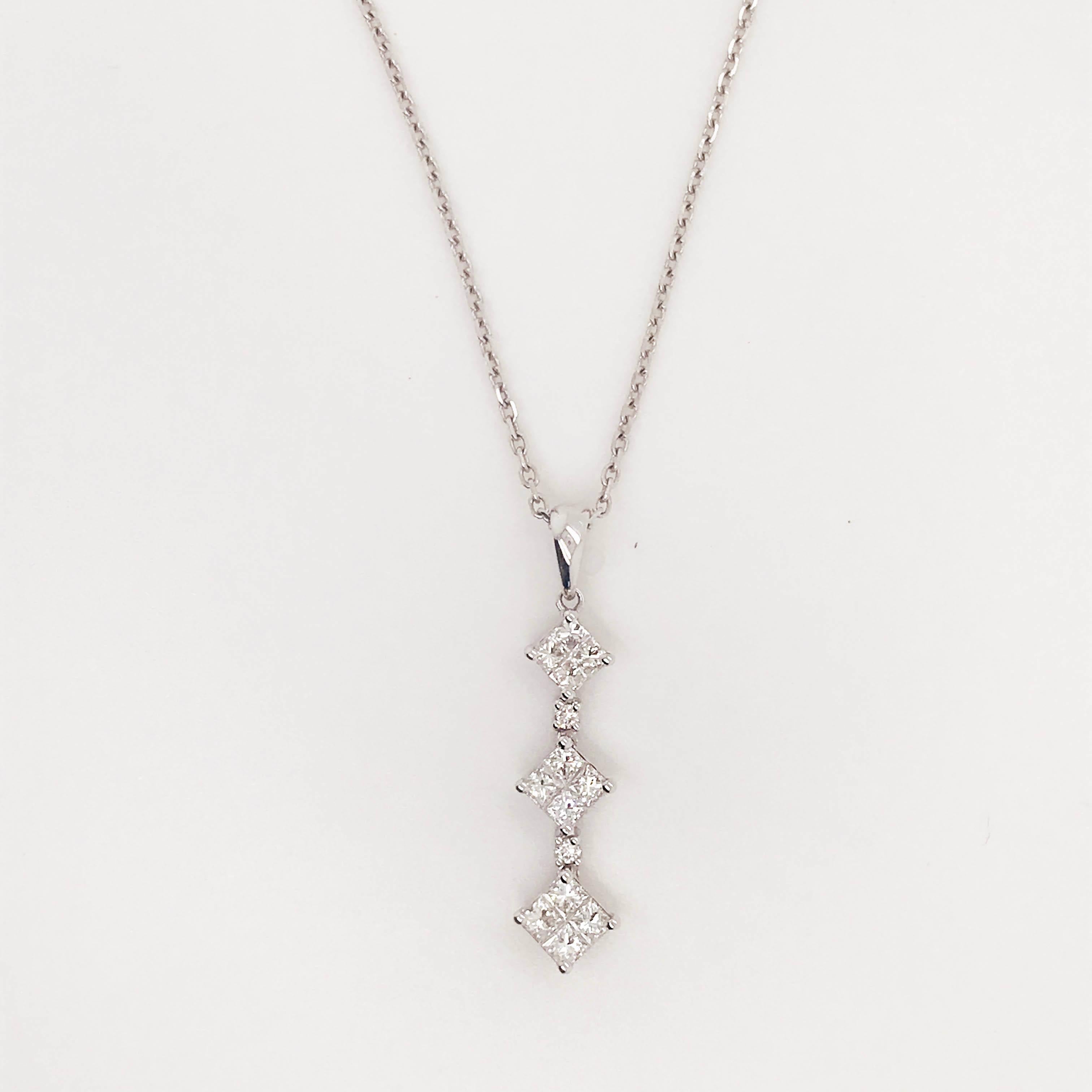 Diamond Drop Necklace in 18 Karat White Gold! This gorgeous diamond covered necklace  is perfect to reflect on the past, present, and future and is so sparkly and bold! The diamond drop has 3 sections of princess cut diamonds that are invisibly set