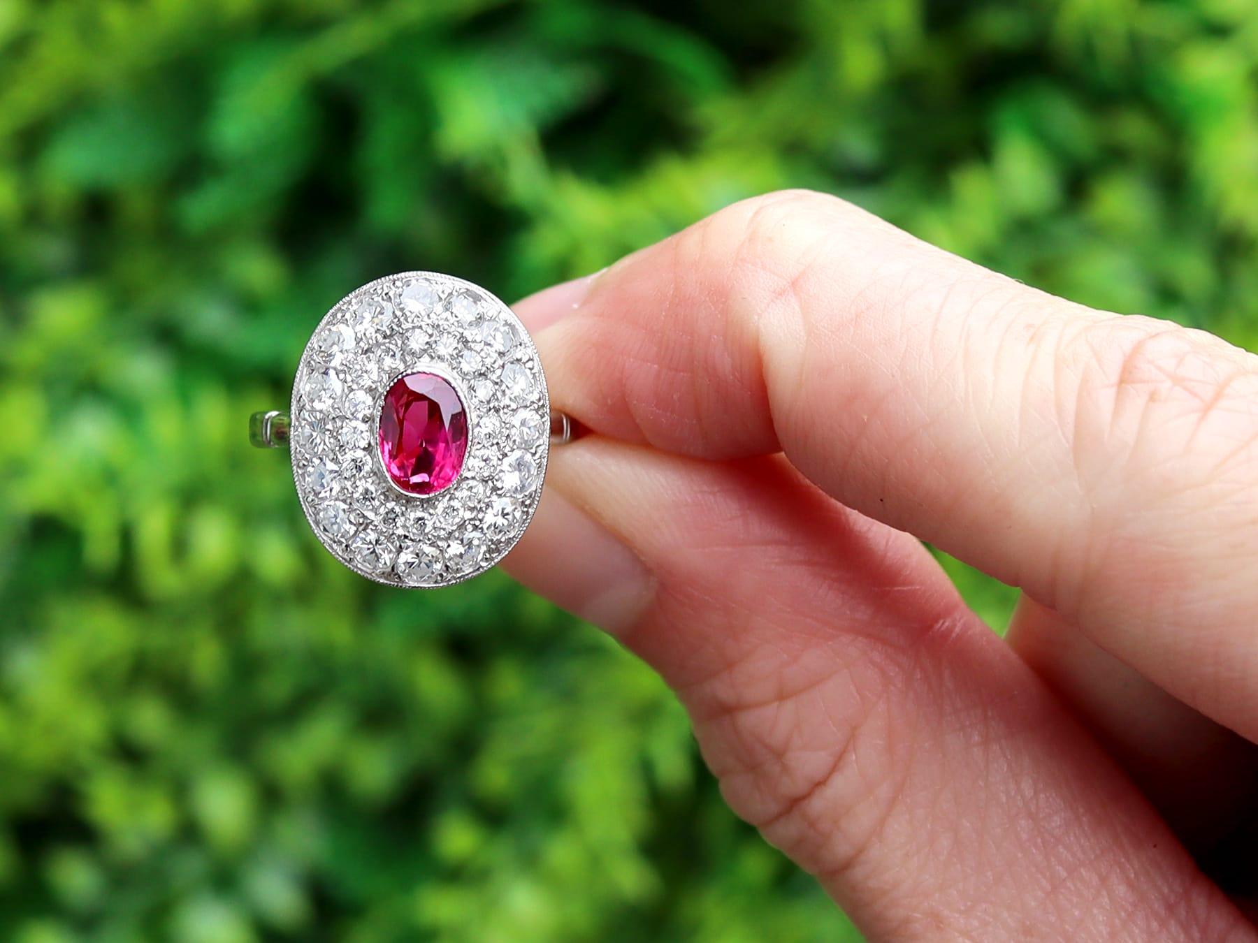 A stunning, fine and impressive vintage 0.75 carat Burmese ruby and 1.38 carat diamond, 18 karat white gold halo ring; part of our vintage jewelry and estate jewelry collections.

This stunning, fine and impressive halo ring has been crafted in 18k