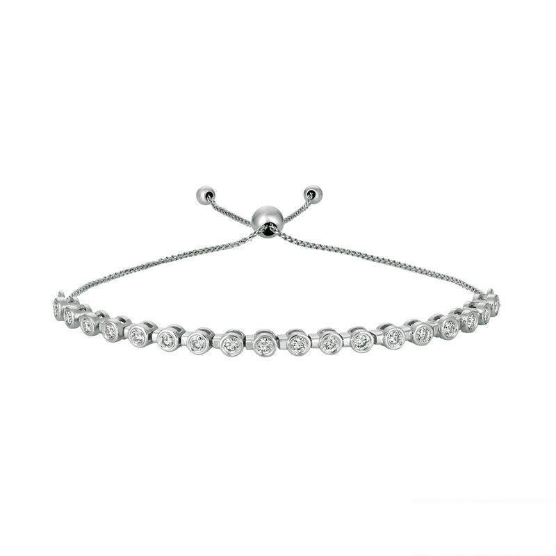 0.75 Carat Natural Diamond Bolo Bezel set Bracelet G SI 14K White Gold 7''

100% Natural Diamonds, Not Enhanced in any way Round Cut Diamond Bracelet 
0.75CT
G-H 
SI  
14K White Gold, Pave Style,   5.4 gram
7-8 inches adjustable length, 1/8 inch in