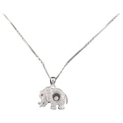0.75 Carat Diamond Elephant Pendant with Floating Diamonds Set in 14 Karat Gold