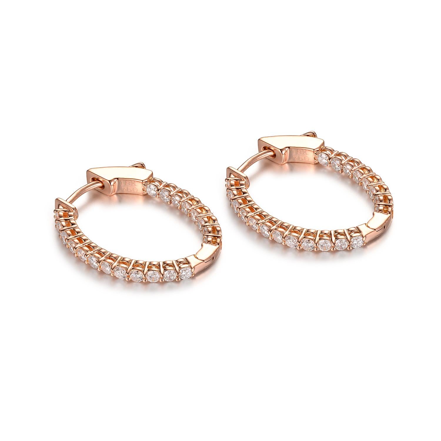 This earrings feature 0.75 carat of white round diamonds. Diamonds are set in the front and back of the hoop earrings. The back uses a push button to secure this dainty yet timeless piece. Great for everyday use and would make a wonderful gift for