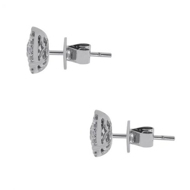 Style: Diamonds stud earrings
Material: 18k white gold
Diamond Details: Approximately 0.75ctw round brilliant diamonds. Diamonds are G/H in color and VS in clarity.
Earring Measurements: 0.60″ x 0.31″ x 0.30″
Fastening: Post friction backs
Total