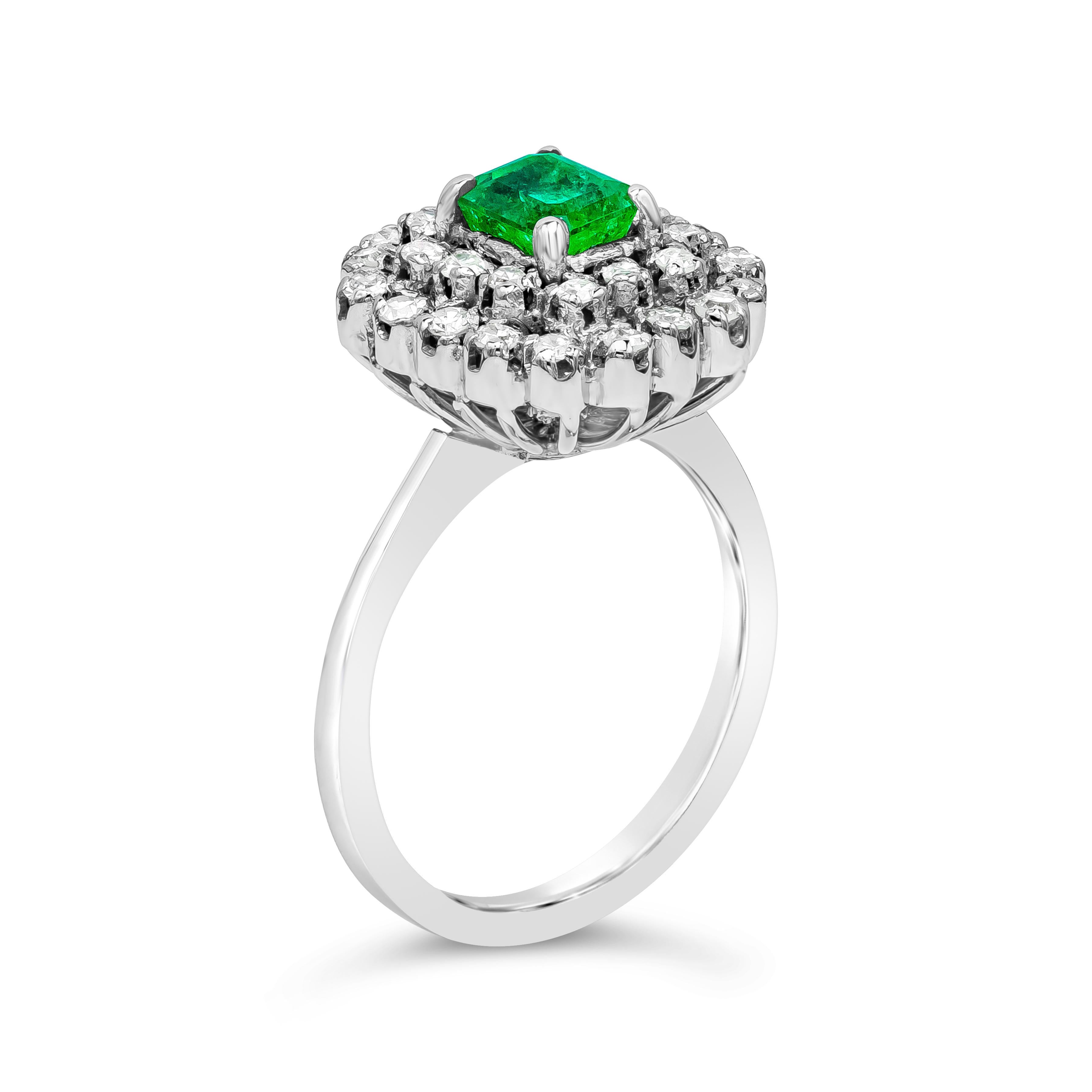 Contemporary Antique 0.75 Carat Emerald Cut Emerald & Diamond Cluster White Gold Fashion Ring For Sale