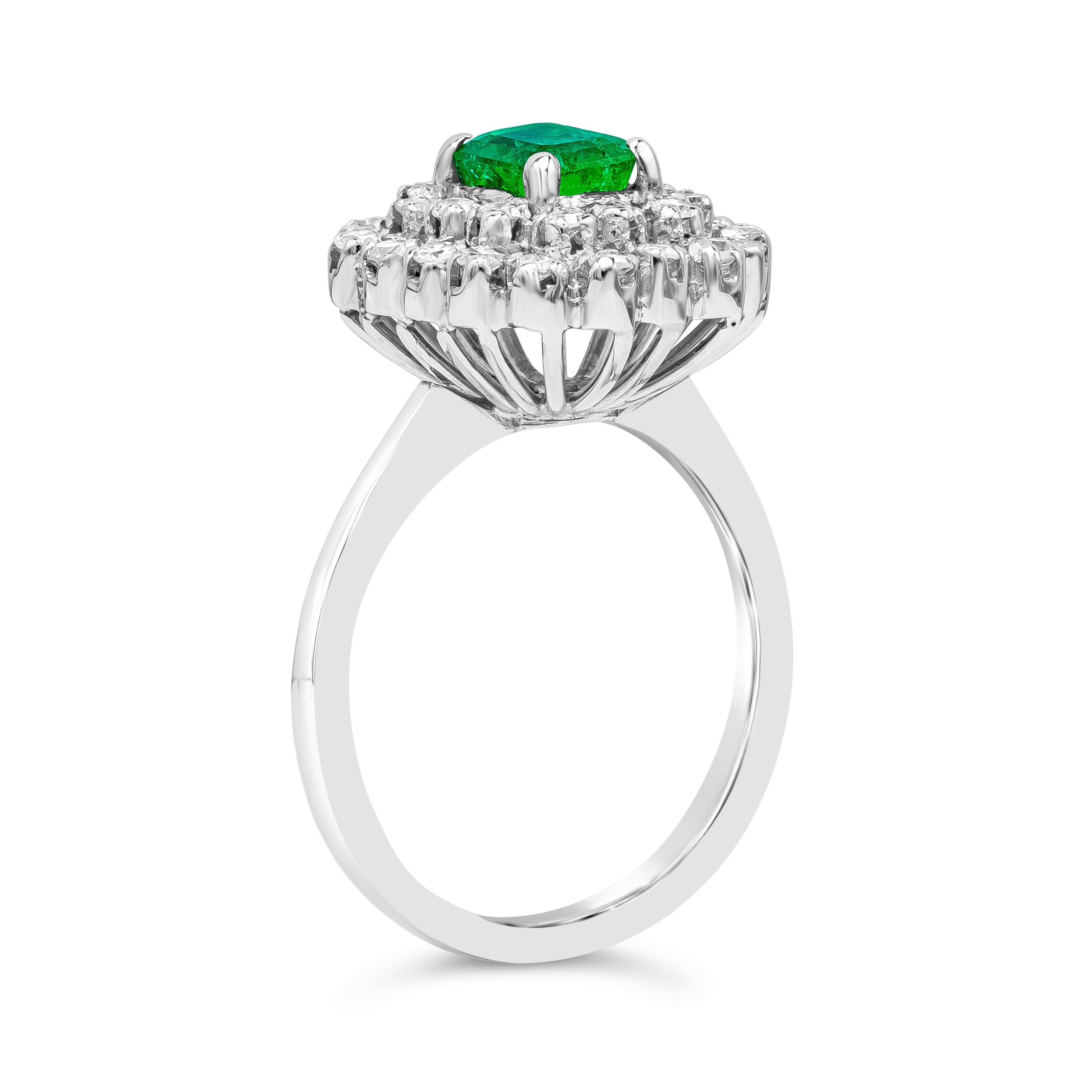 Antique 0.75 Carat Emerald Cut Emerald & Diamond Cluster White Gold Fashion Ring In Excellent Condition For Sale In New York, NY