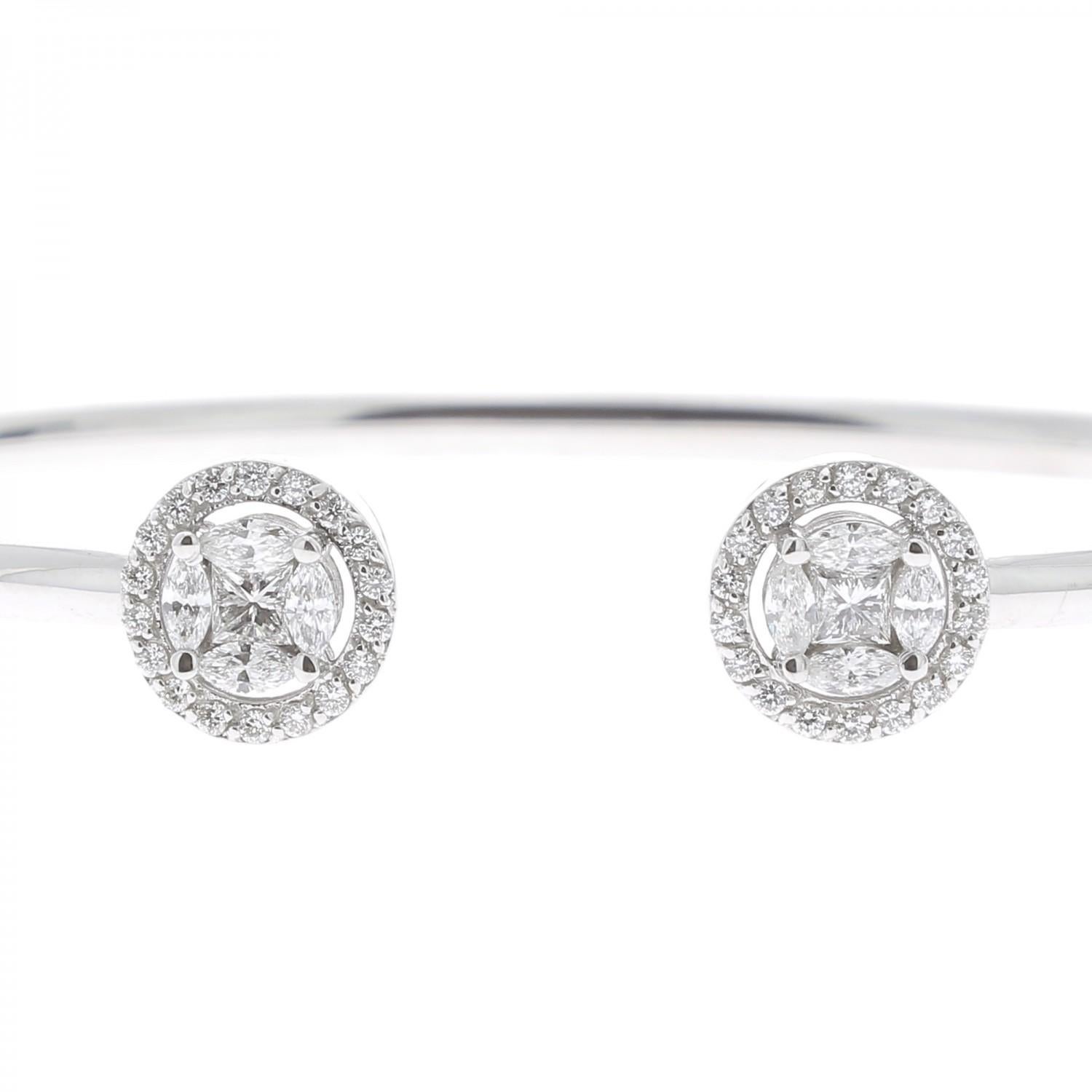 An amazing Diamond Bangles Bracelet set with 4 Marquise Diamonds and Round Diamonds weighing 0.75 Carats.
The Diamonds are GVS quality.
The Bangle Bracelet is made of 18K White Gold.
The Diamond Bracelet weight 8.11 Grams.
The Diameter of the