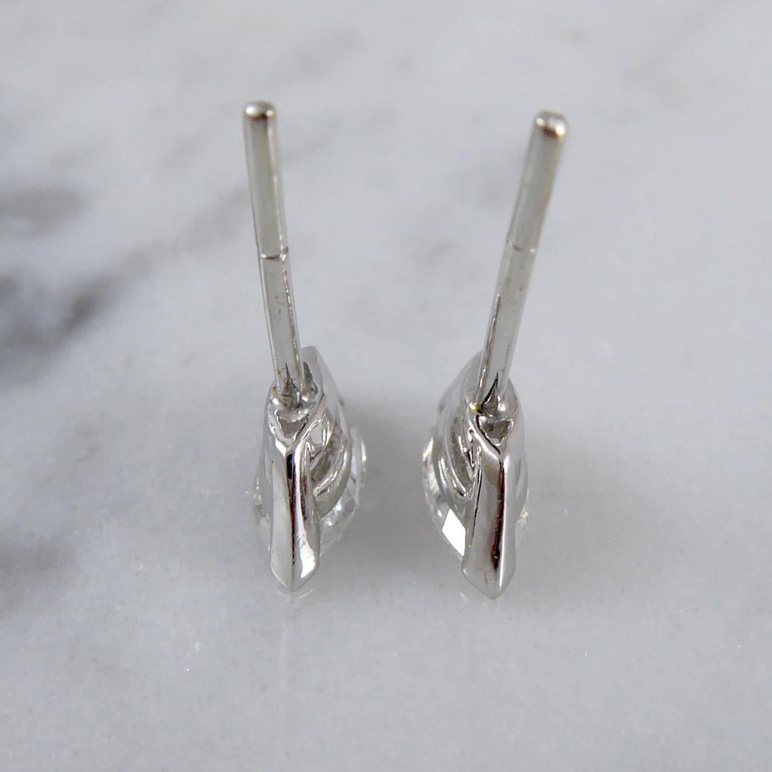 An unsual cut stone for earrings but these marquise diamonds are so flattering and sit delicately on the earlobe.  Each marquise cut stone is approx. 7.7mm long,  is assessed as E/F colour and VS2/SI1 clarity and, together, they weigh 0.75ct.  White