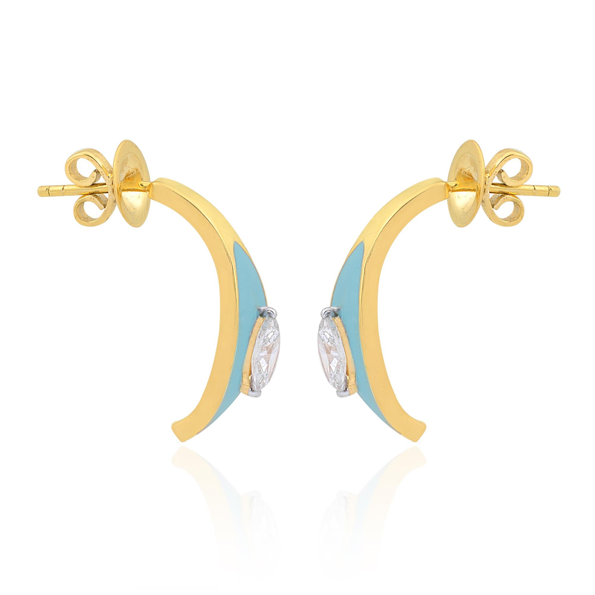 Adorn yourself with elegance and sophistication with these stunning 0.75 Carat Marquise Diamond Turquoise Enamel Half Hoop Earrings in 14k Yellow Gold. Crafted with meticulous attention to detail, these earrings seamlessly blend classic allure with