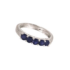 Anillo de 5 piedras con zafiro natural de 0,75 quilates y oro blanco de 14 quilates