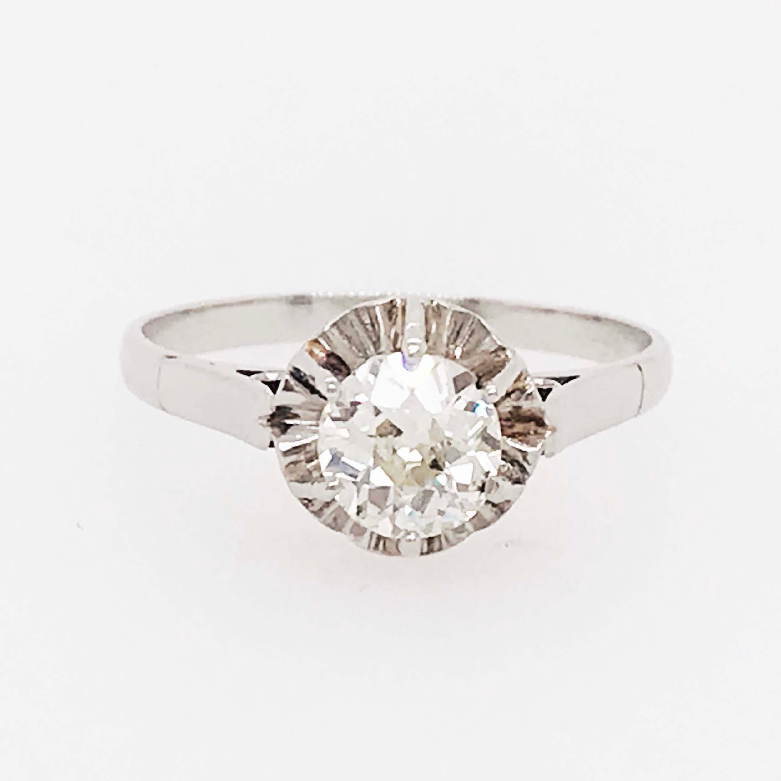 This is a truly unique diamond solitaire engagement ring! With a natural and genuine Old European cut Diamond set in six prongs. The old European cut diamond is breathtaking and such a great size! Weighing approximately 0.75 carats with SI-1 clarity