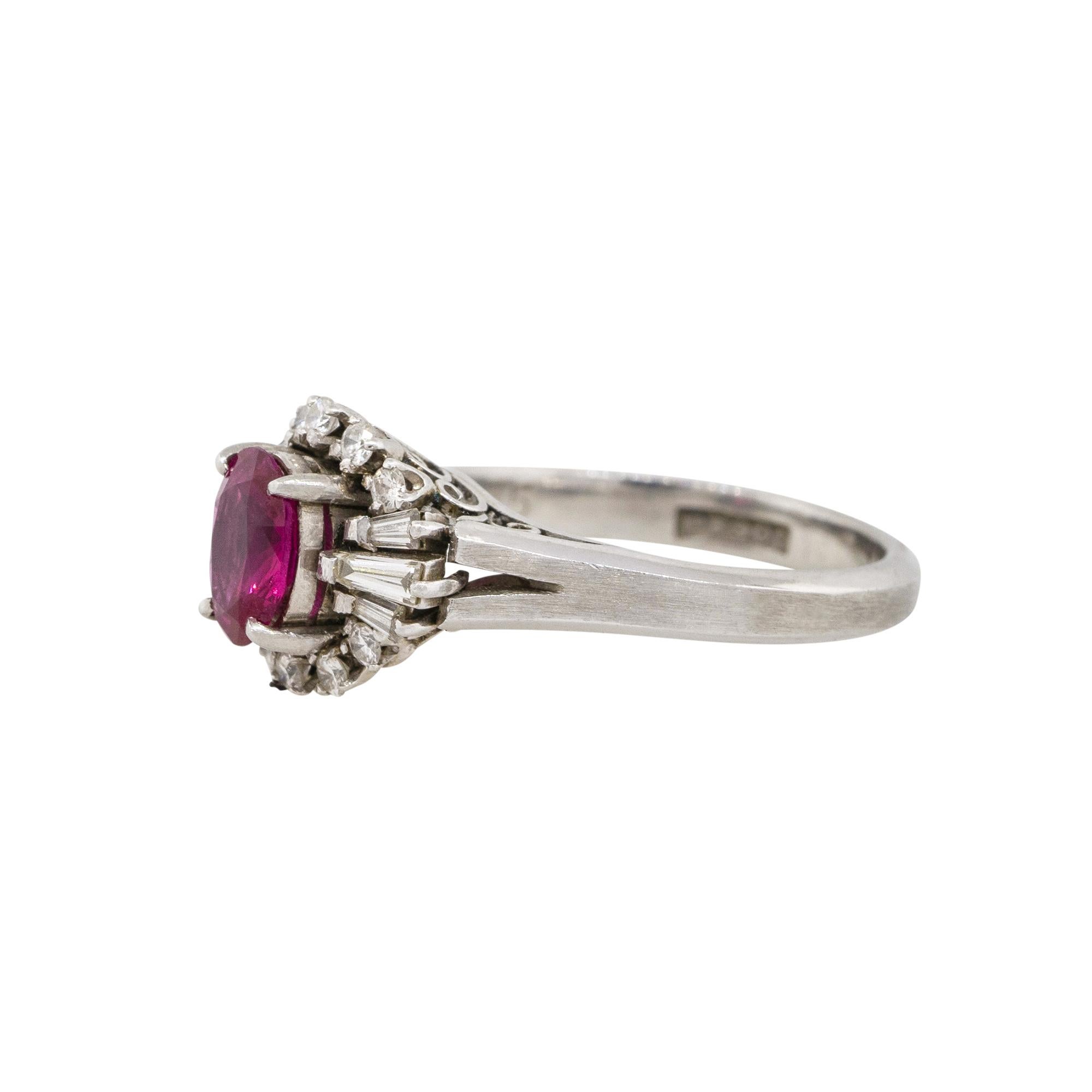 Material: Platinum
Gemstone details: Approx. 0.75 oval cut Ruby gemstone
Diamond details: Approx. 0.36ctw of round and baguette cut diamonds. Diamonds are G/H in color and VS in clarity
Ring Size: 4.75  
Ring Measurements: 0.60
