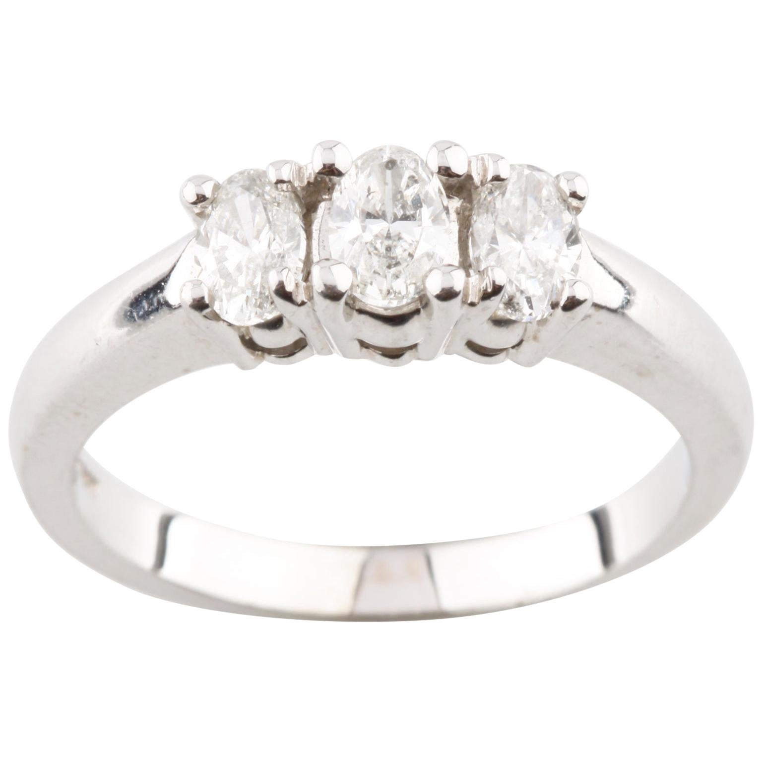0.75 Carat Oval Diamond Three-Stone Engagement Ring in White Gold For Sale
