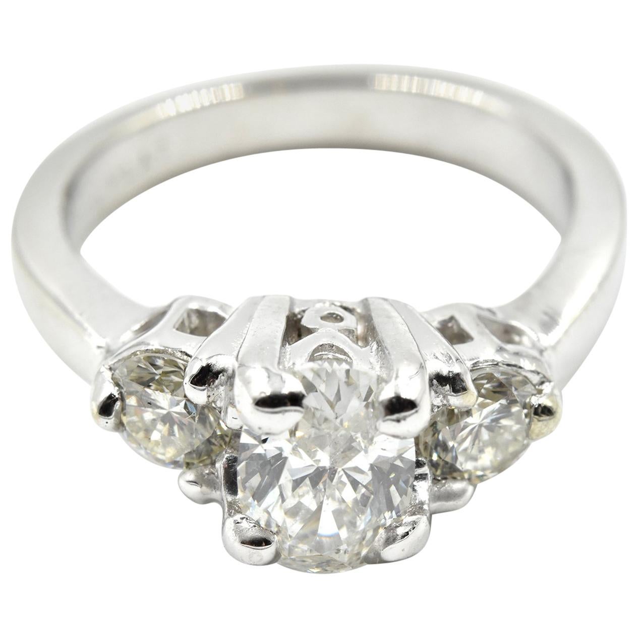 0.75 Carat Oval Diamond Three-Stone Platinum Engagement Ring