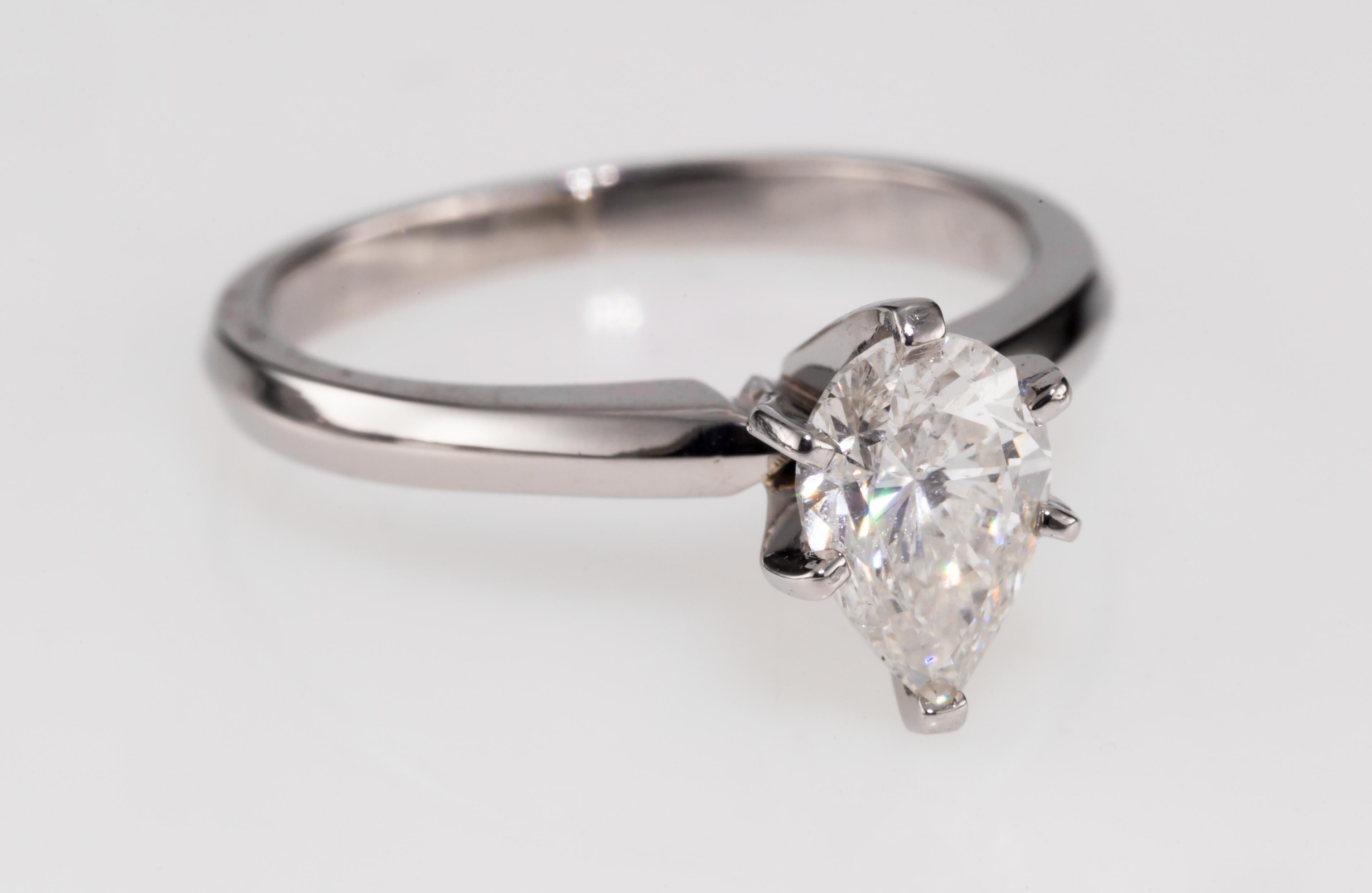 0.75 Carat Pear Shaped Diamond Platinum Solitaire Engagement Ring In Fair Condition For Sale In Sherman Oaks, CA