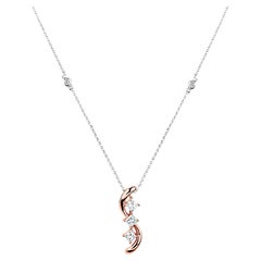 Collar de oro rosa y blanco con diamantes rosas y blancos de 0,75 quilates