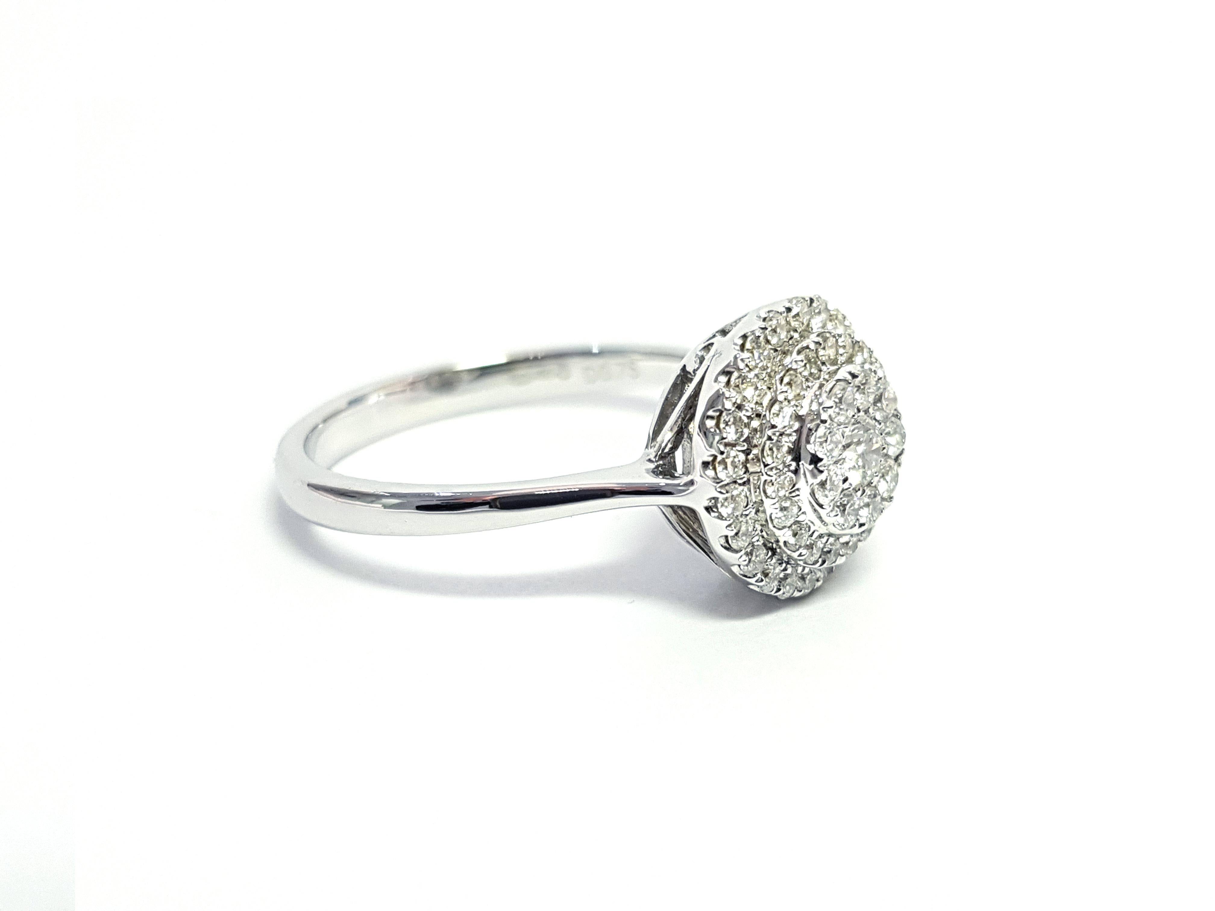 Modern 0.75 Carat Round Cut Cluster 18 Karat White Gold Double Halo Diamond Ring For Sale