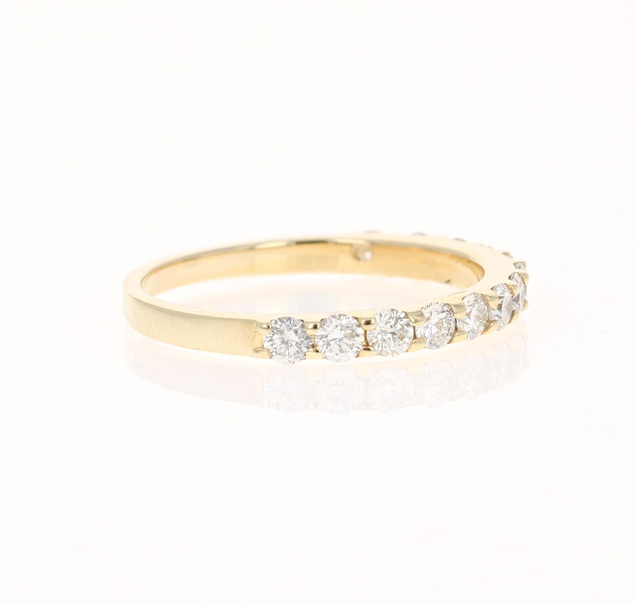 A beautiful band that can be worn as a single band or stack with other bands in other colors of Gold! 

This ring has 13 Round Cut Diamonds that weigh 0.75 Carats. The clarity and color of the diamonds are VS-H.

Crafted in 14 Karat Yellow Gold and