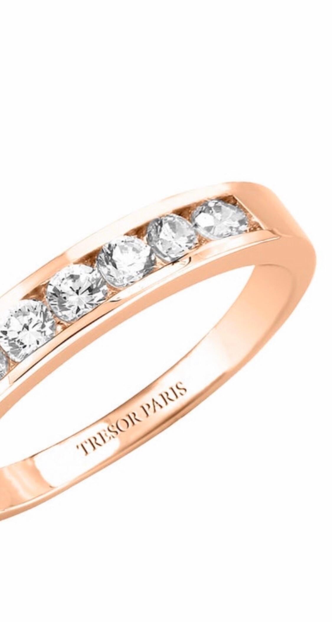 This Channel set 18 Karat Rose Gold half Eternity Ring is an exquisite addition to our collection. A sparkling array of seven H-SI1 Round Brilliant Diamonds for a classic and iconic look. This Ring has a total Diamond weight of 0.75 Carats, the