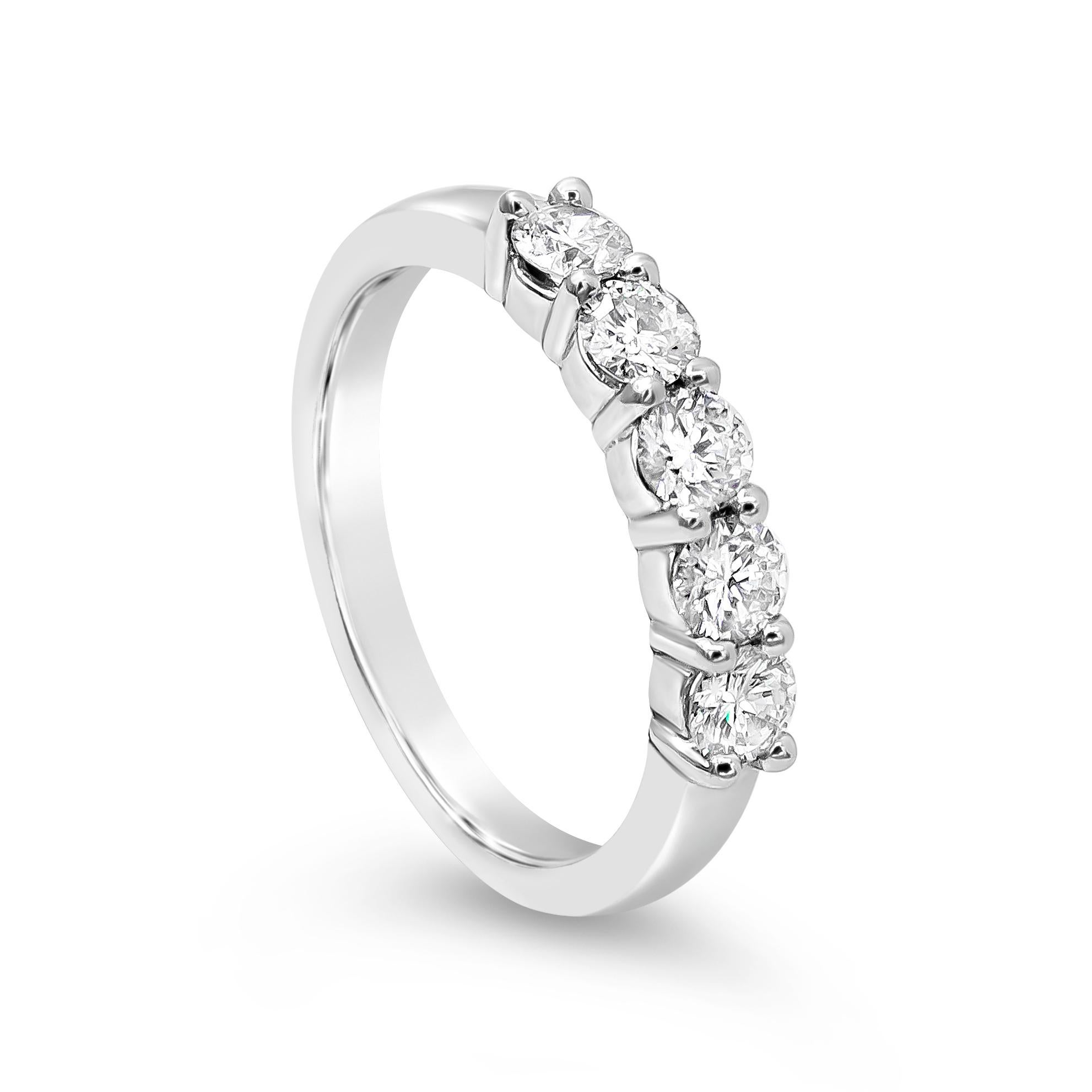 A classic wedding band style showcasing five round brilliant diamonds weighing 0.75 carats total. Made with Platinum. Size 6 US

Style available in different price ranges. Prices are based on your selection. Please contact us for more information.