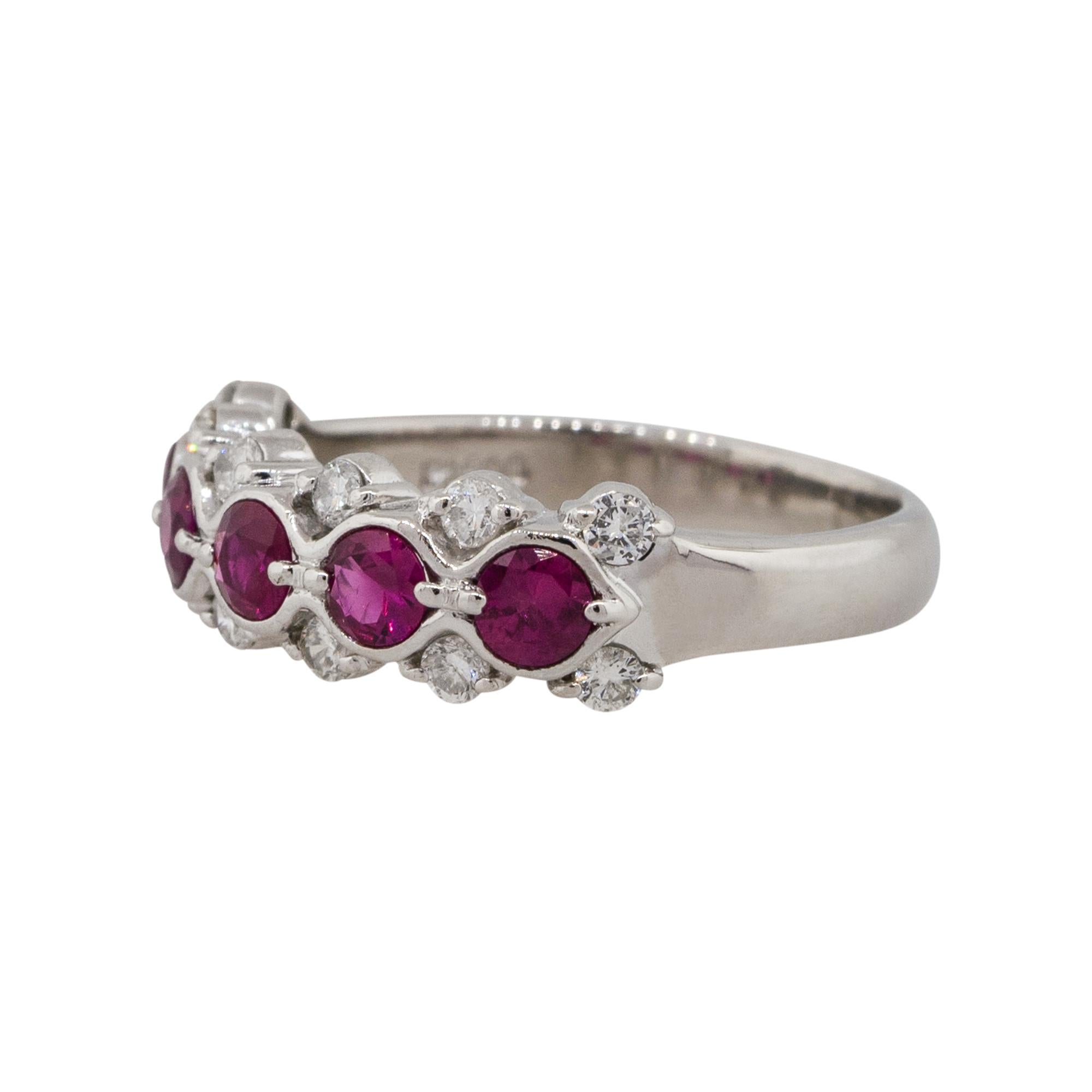 Material: Platinum
Gemstone details: Approx. 0.75ctw Round cut Ruby gemstones
Diamond details: Approx. 0.30ctw of Round cut Diamonds. Diamonds are G/H in color and VS in clarity
Ring Size: 6 
Ring Measurements: 0.75