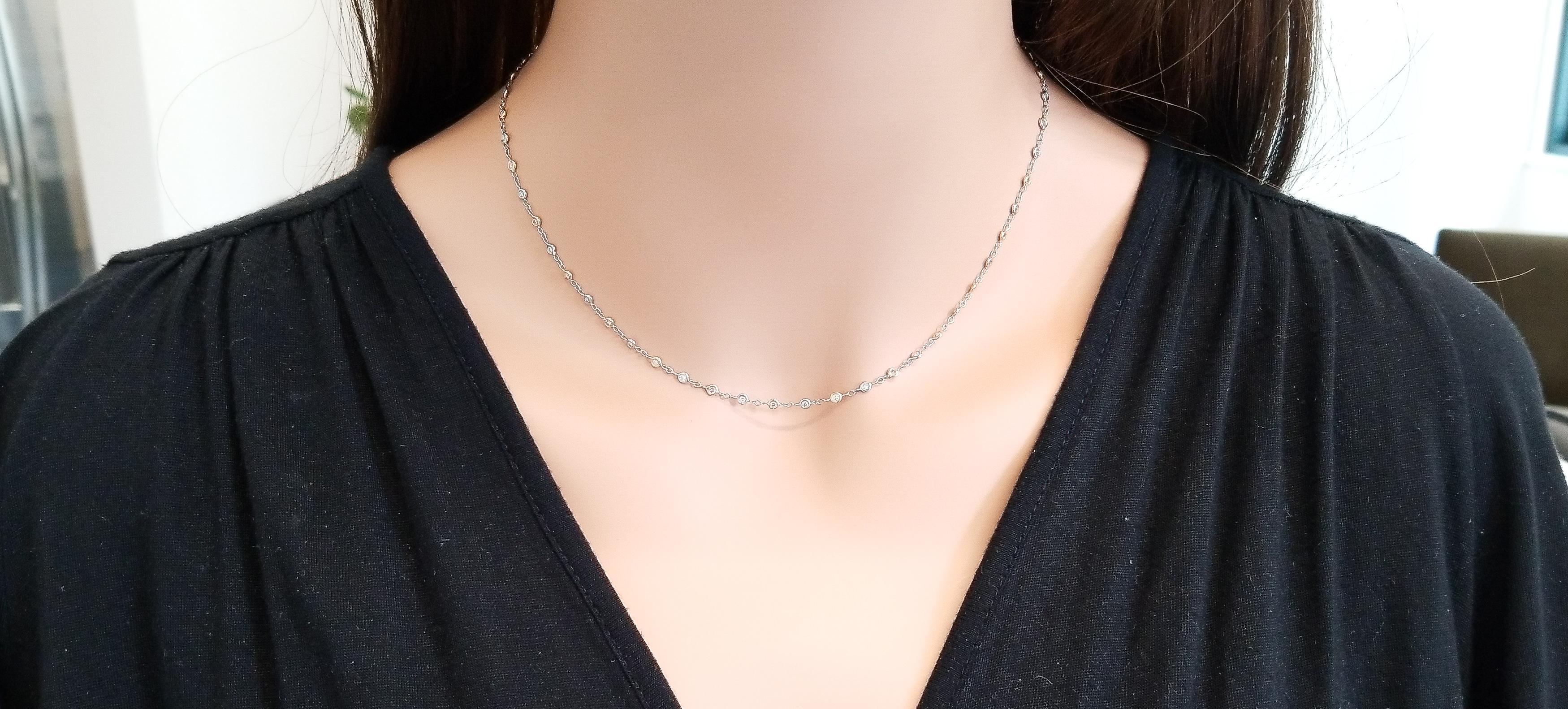 A gorgeous diamond necklace will rarely go overlooked. This 18 inch piece is both rare and stunning. It includes alternating wire-wrapped bezels that set white and natural pink round diamonds. There are 27 white diamonds that total 0.39 carat total