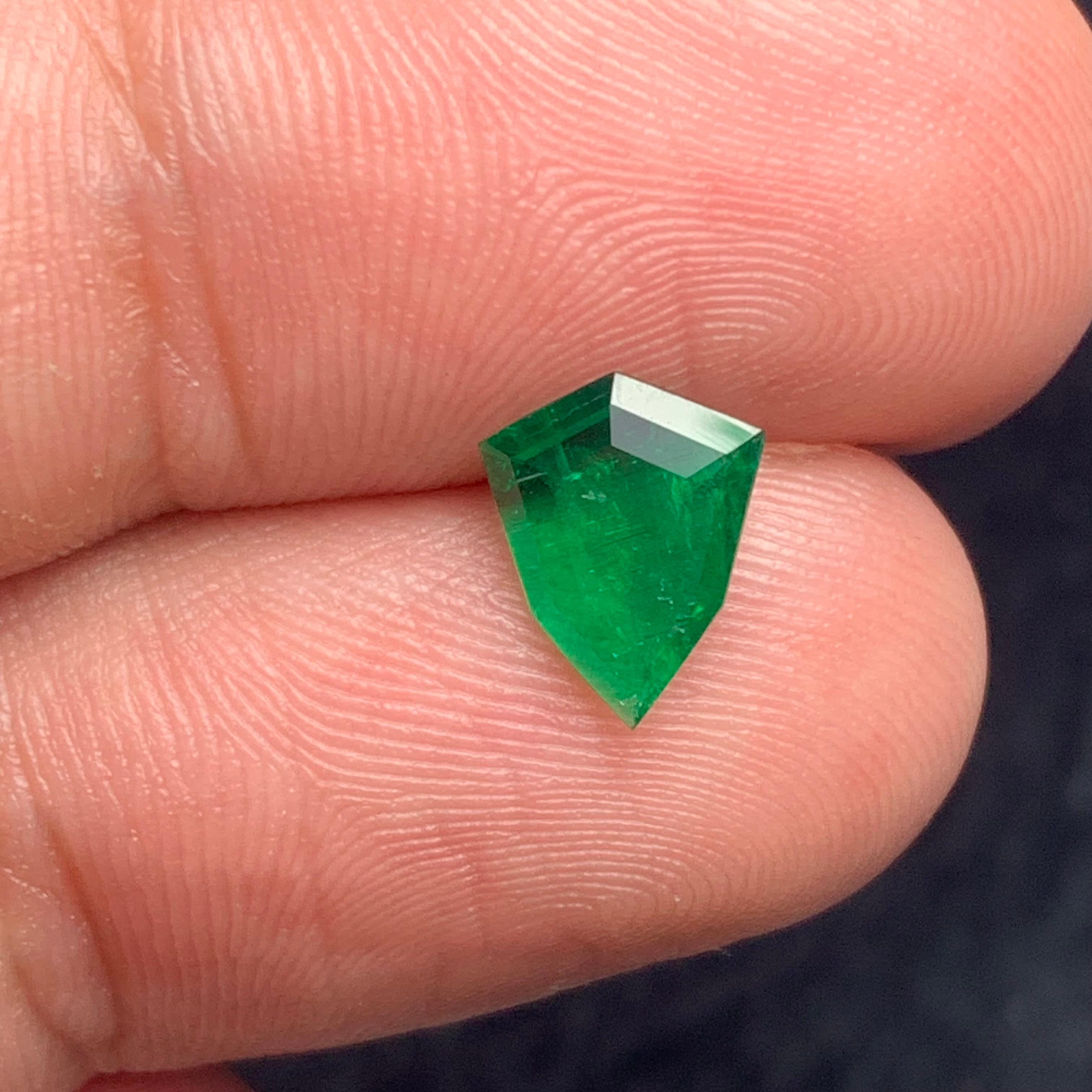 Shield Cut 0.75 Carats Shield Shape Loose Green Emerald from Swat Pakistan Mine