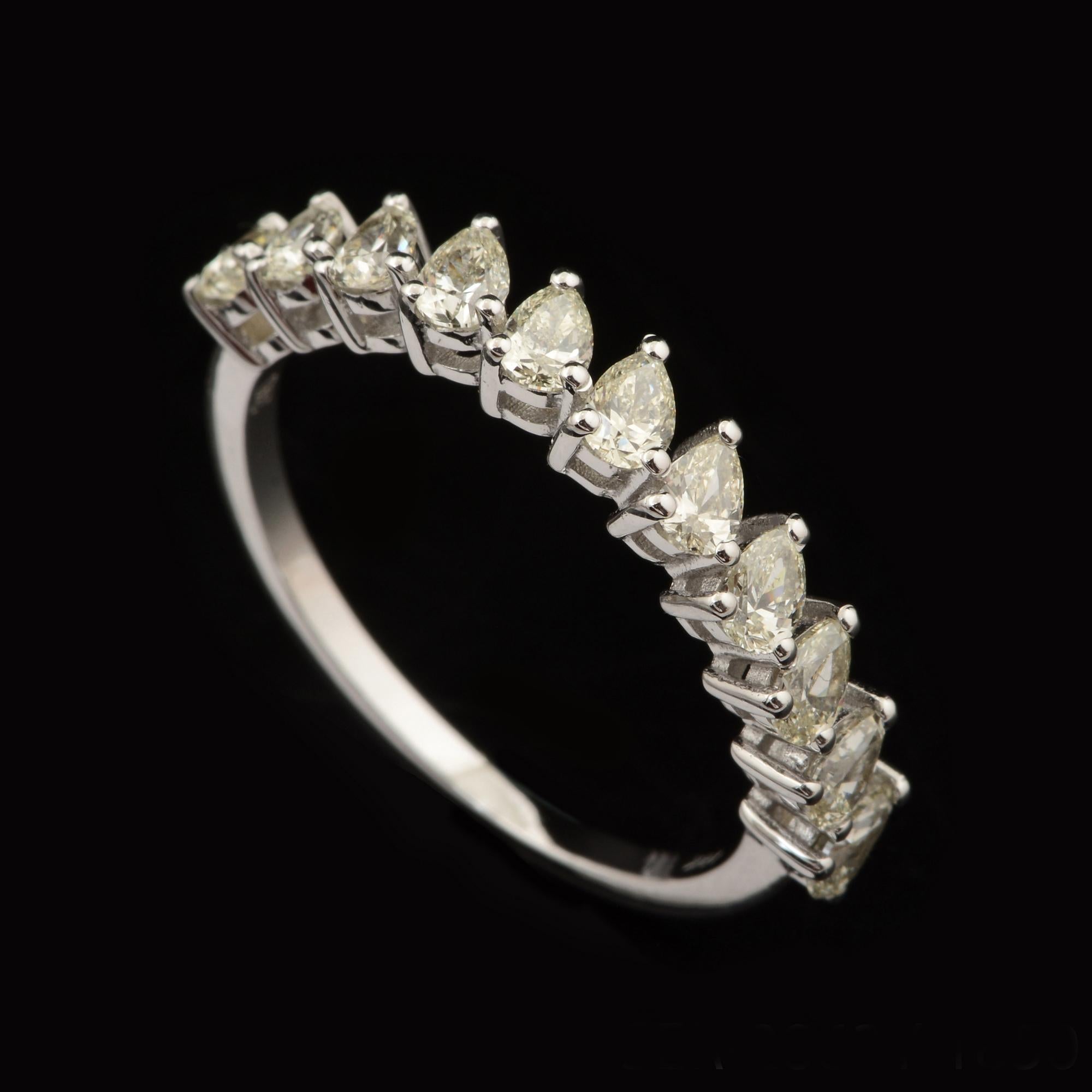 For Sale:  0.75 Ct SI Clarity HI Color Pear Diamond Curve Design Ring 18 Karat White Gold 6