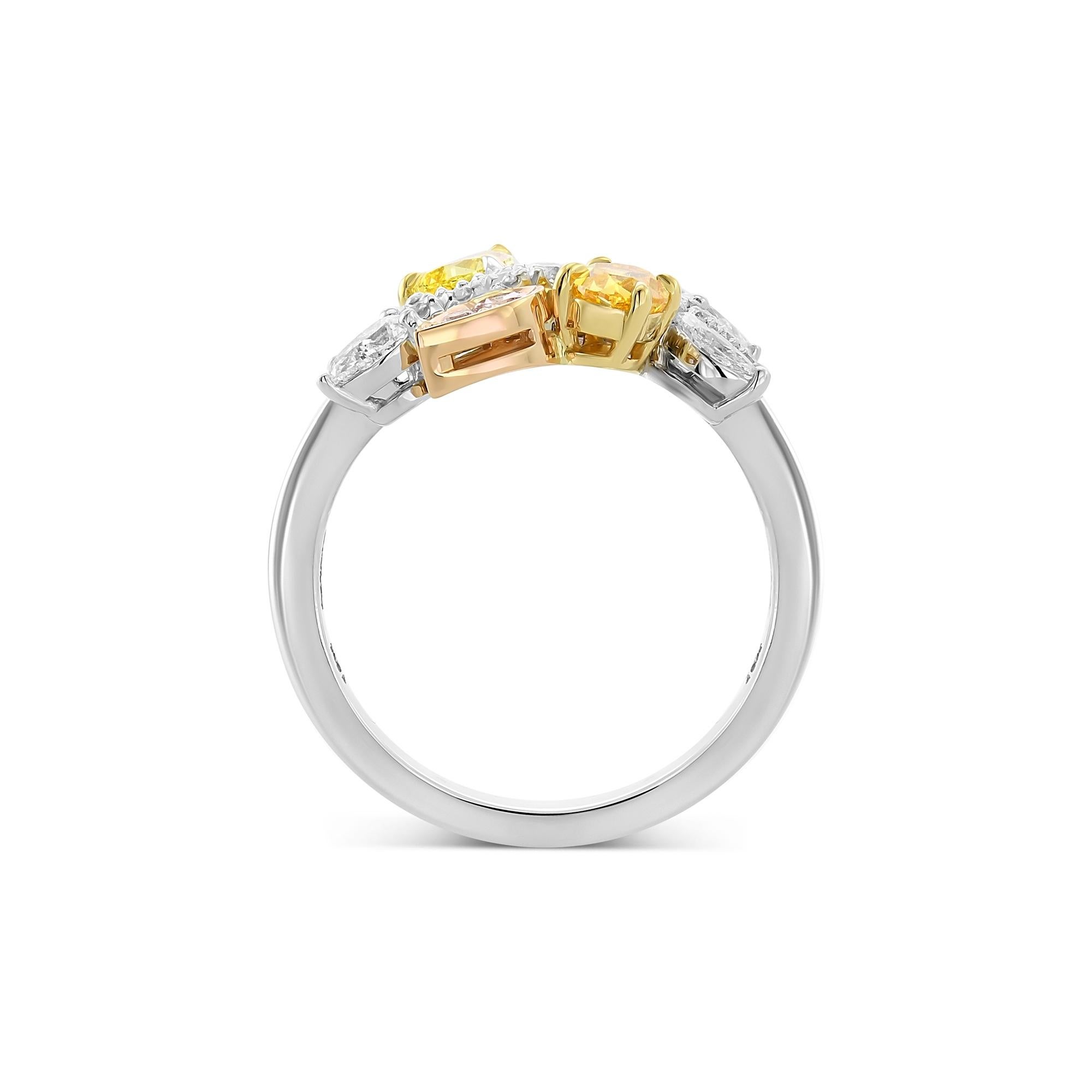 Inspired by nature, this beautiful cluster ring features shades of orange, pink and yellow diamonds styled in an asymmetrical design and certified by GIA. These diamonds are accented by collection color pears, marquise and brilliants, all styled in