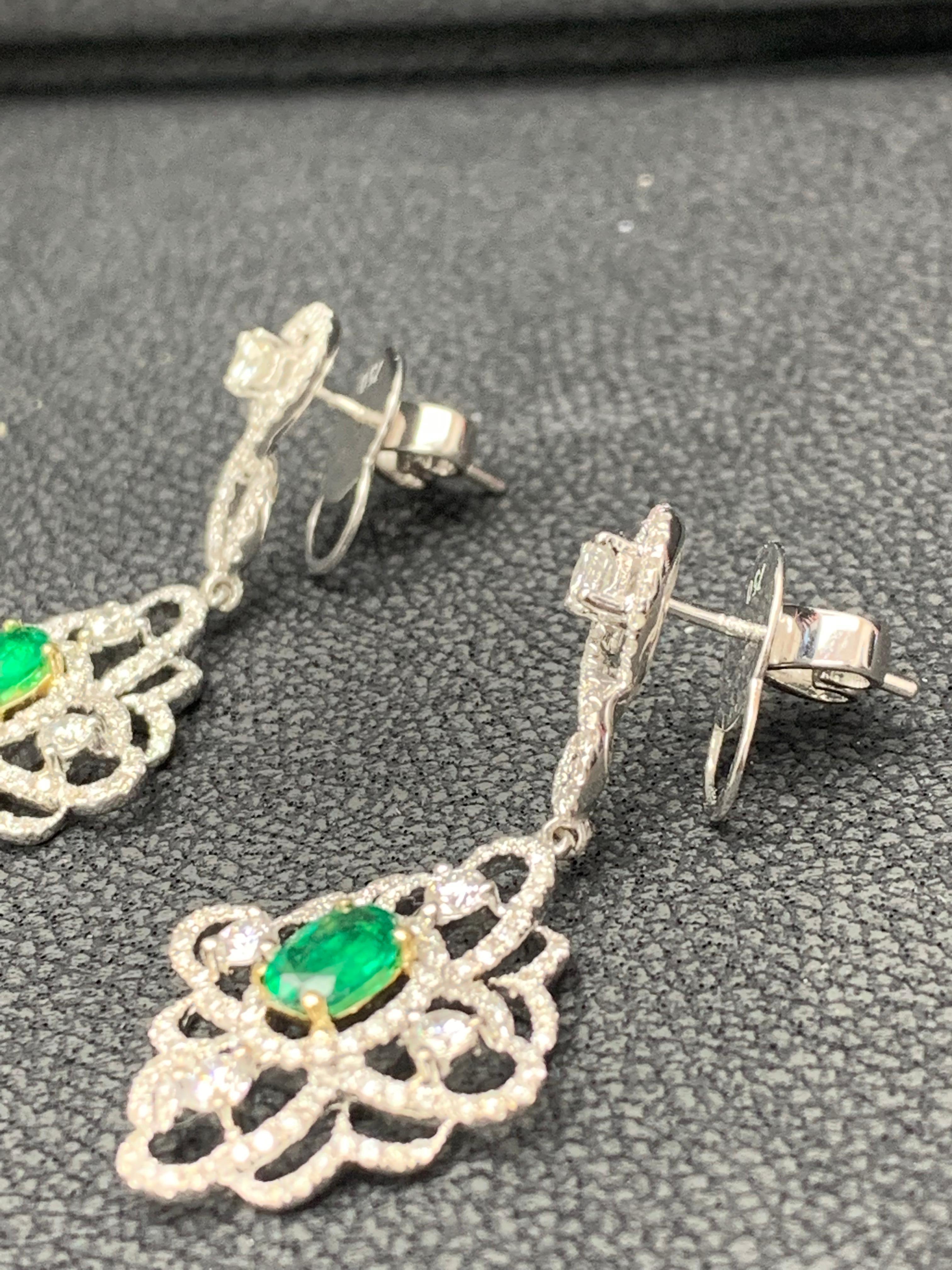 0.75 Oval Cut Emerald and Open-Work Diamond Chandelier Earrings in 18K Mix Gold For Sale 1