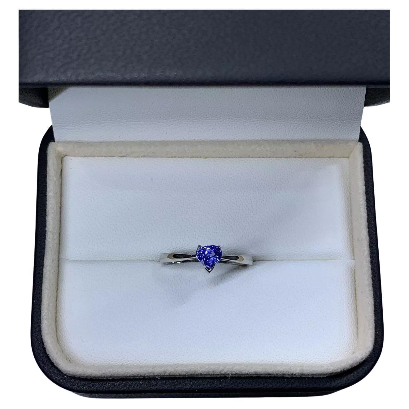0.75ct Blue sapphire heart solitaire engagement ring in platinum.